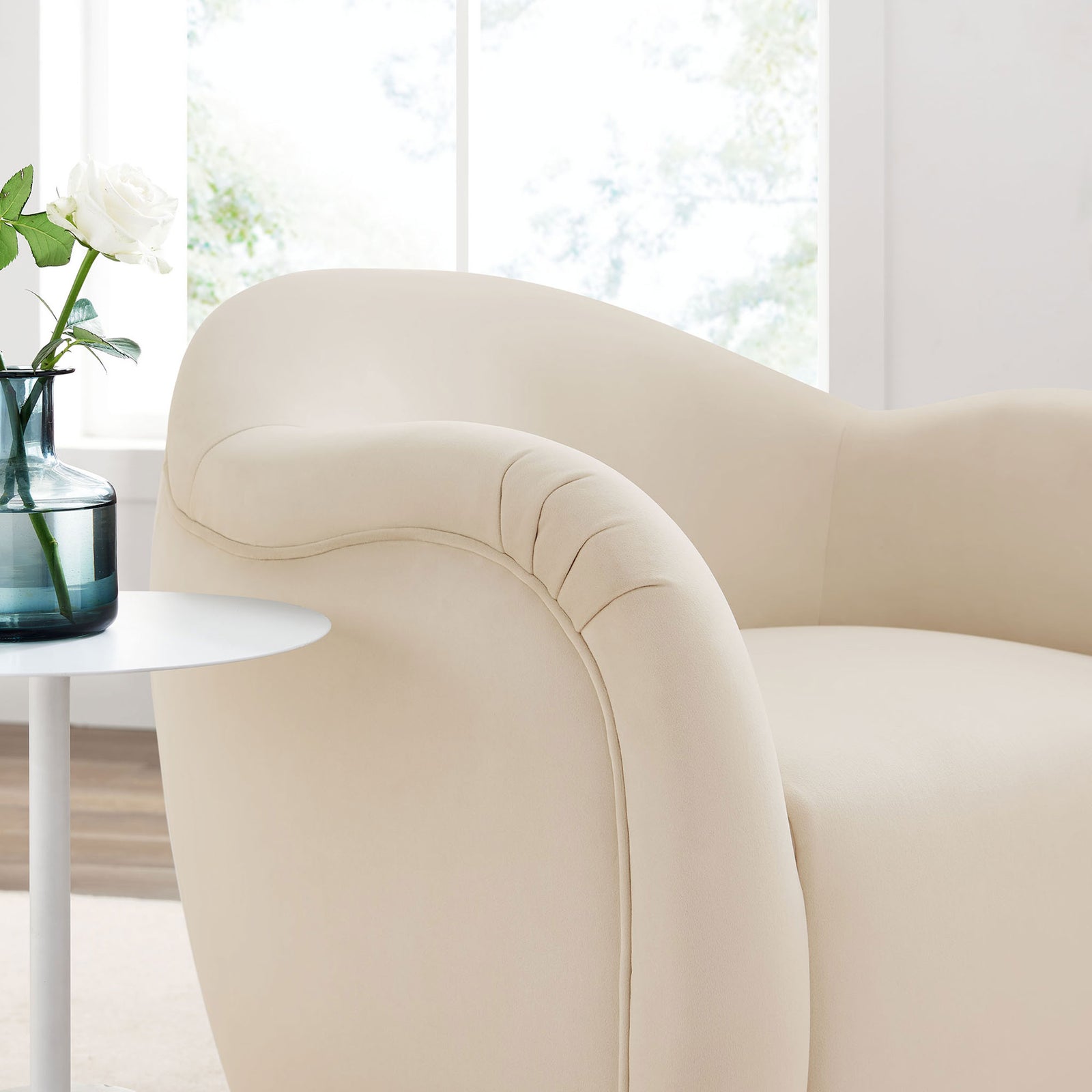 Alabaster velvet upholstery with gentle curves and contour stitching adds inviting texture. || EEI-6959-ALA || detail_room
