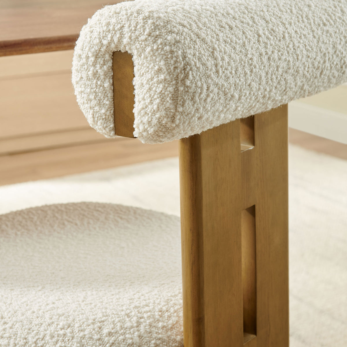 Textured boucle back cushion pairs with the warm wood frame for inviting modern dining style || EEI-6960-FRO-IVO || detail_room