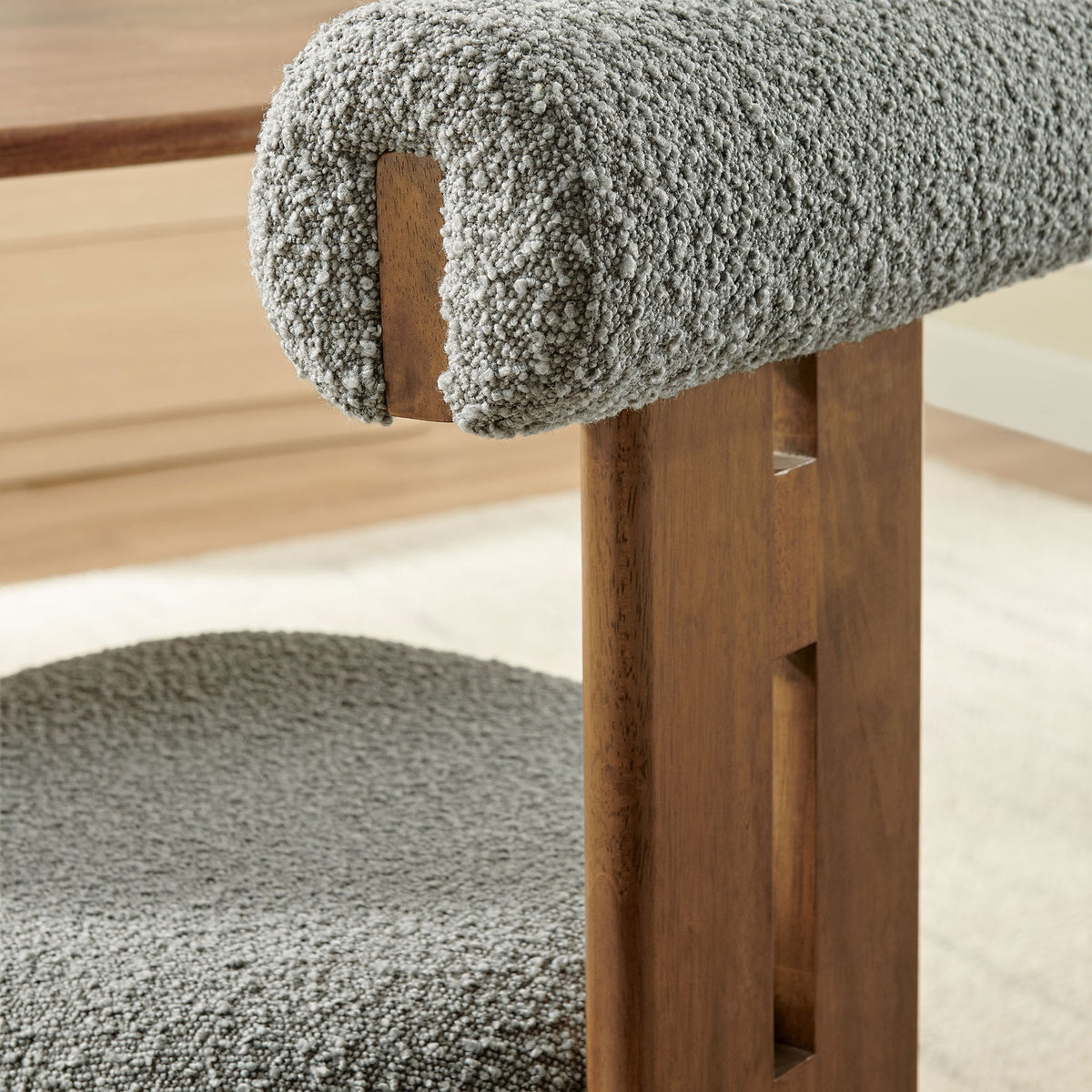 Gray boucle roll-back headrest paired with stacked walnut back supports for sculptural flair || EEI-6960-WAL-LGR || detail_room