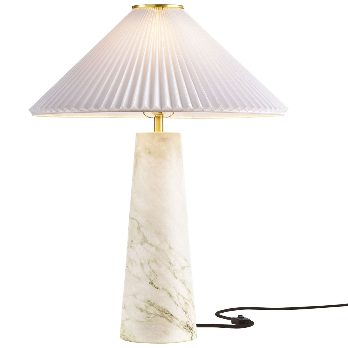 Nera table lamp glowing warmly with white marble-look base and wide pleated fabric shade. || EEI-6963-WHI || front_on_studio