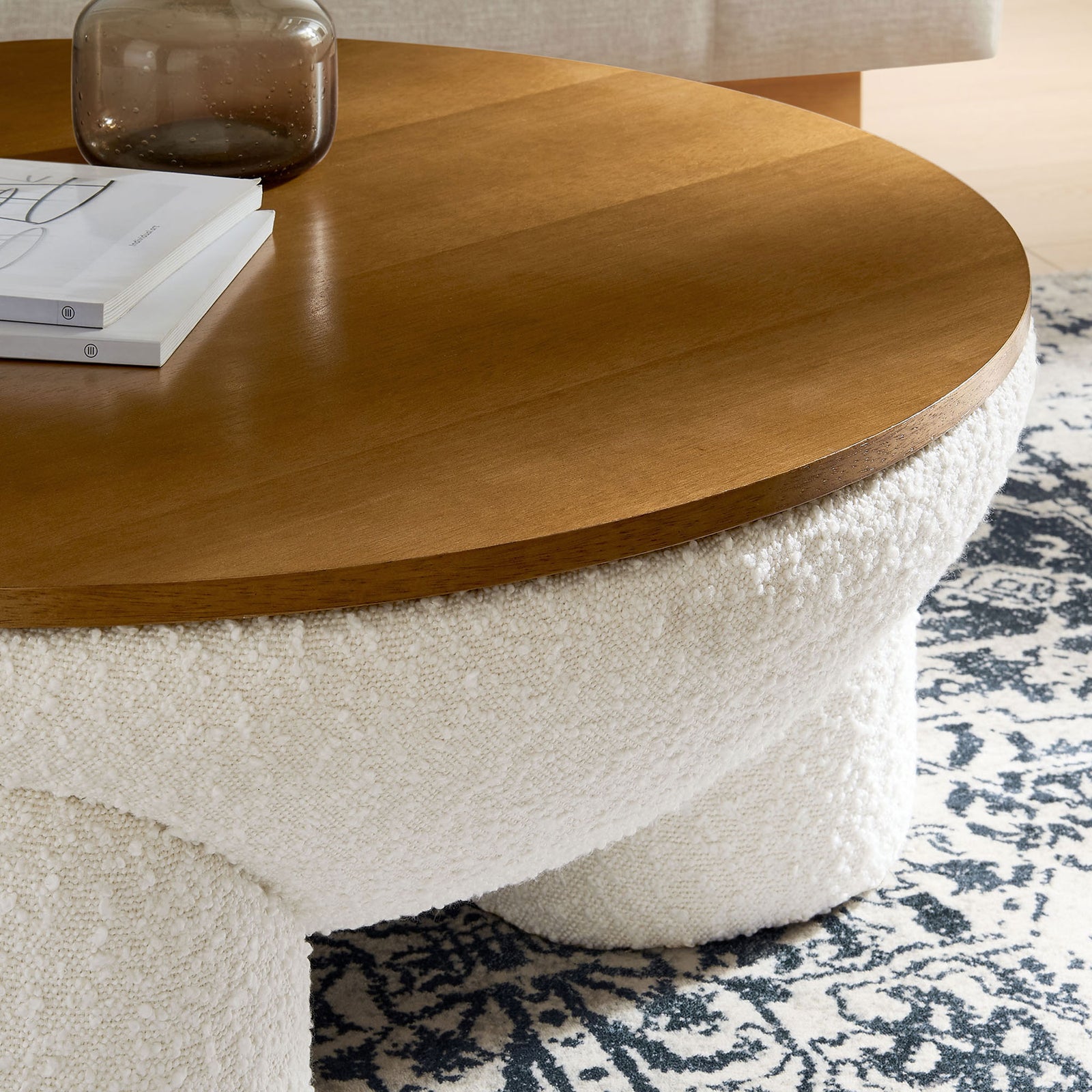 Natural wood top adds contrast to the soft boucle base for a cozy, lived-in look || EEI-6964-NAT-IVO || detail_room