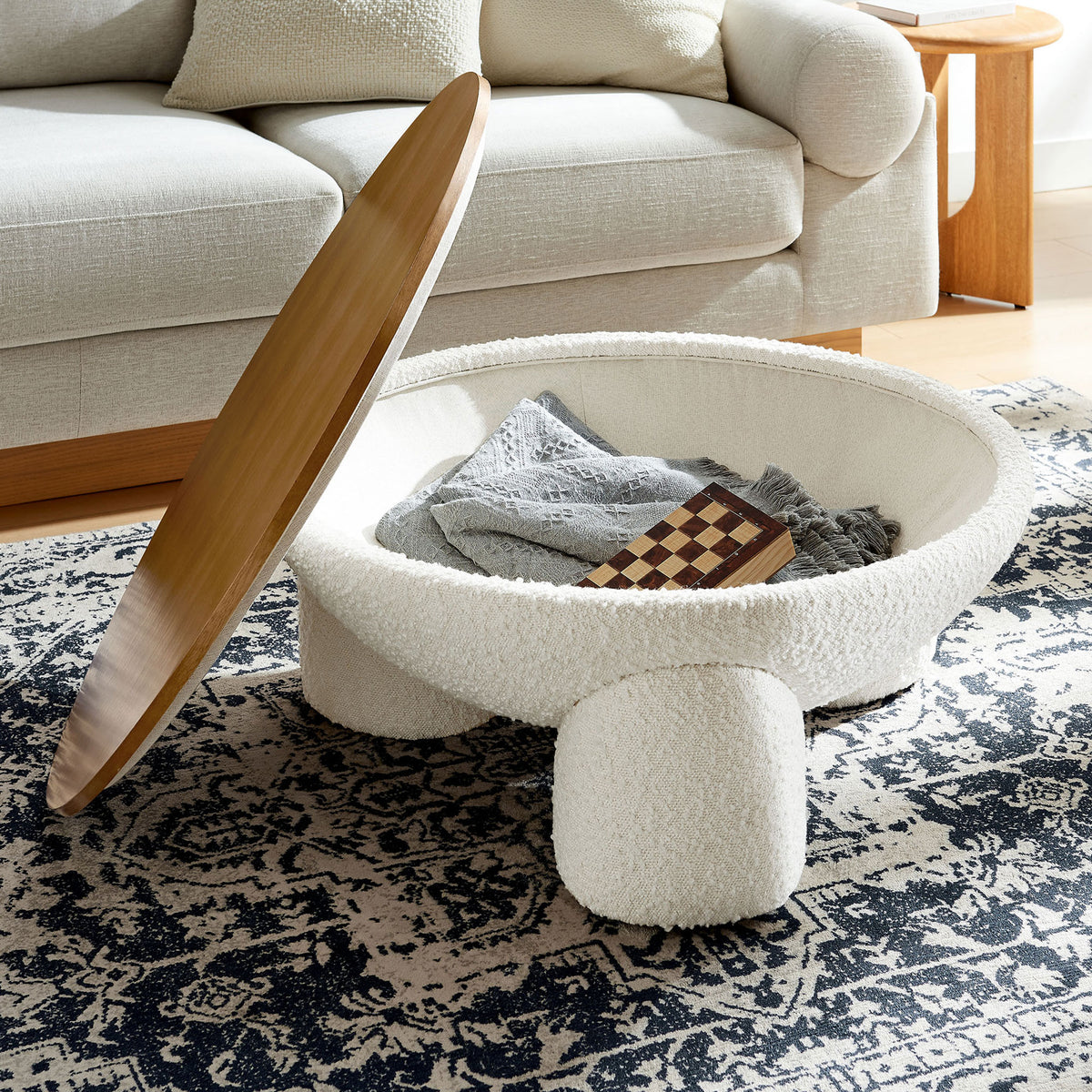 Hidden storage inside keeps living room essentials close, with removable wood lid for easy access || EEI-6964-NAT-IVO || front_angle_open_room