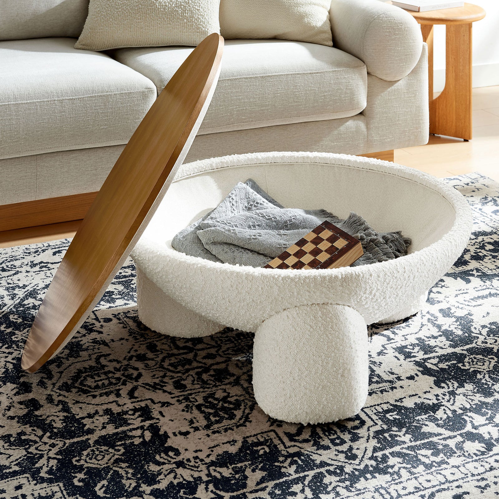 Hidden storage inside keeps living room essentials close, with removable wood lid for easy access || EEI-6964-NAT-IVO || front_angle_open_room