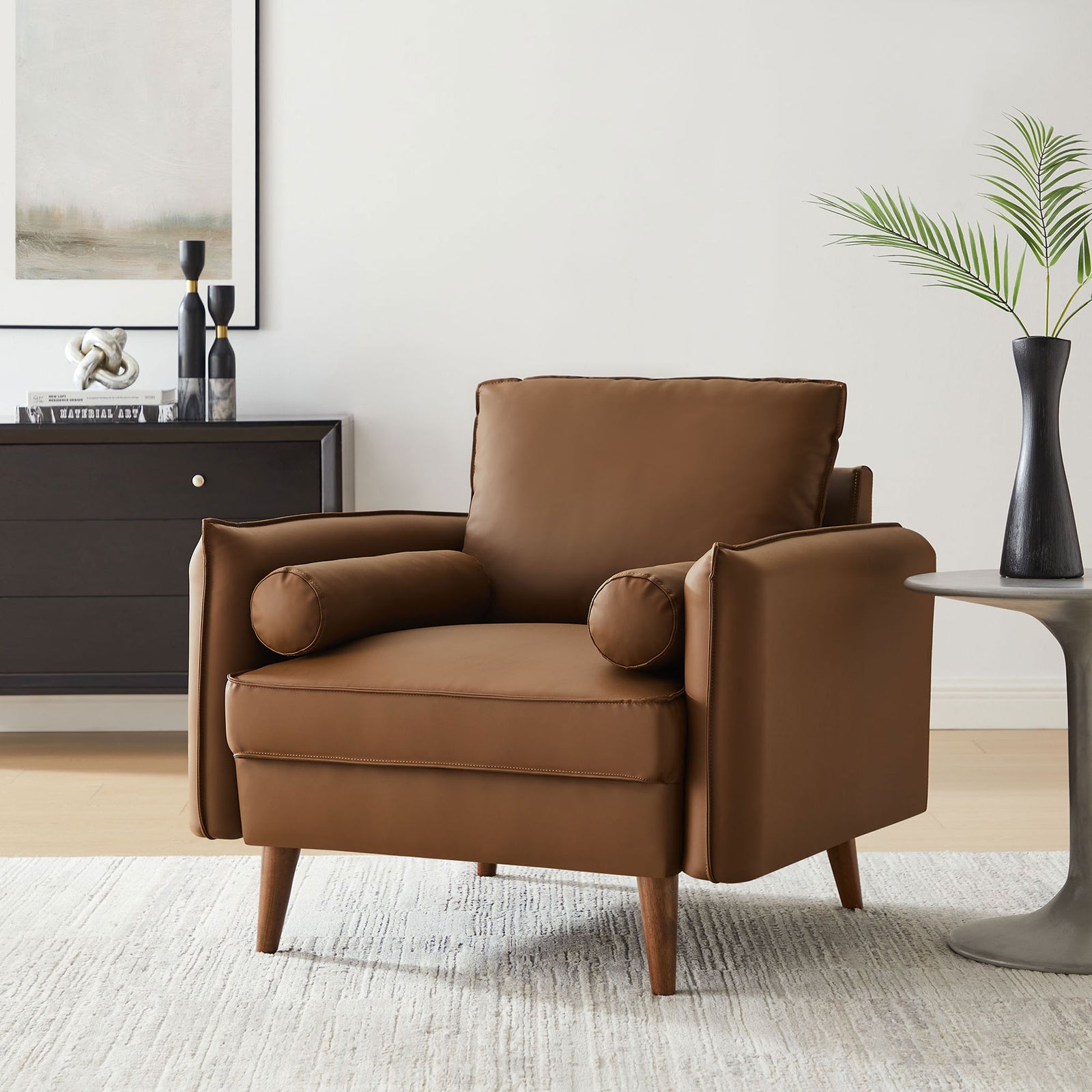 Warm brown faux leather chair brings modern comfort to the living room || EEI-6973-BRN || front_angle_room