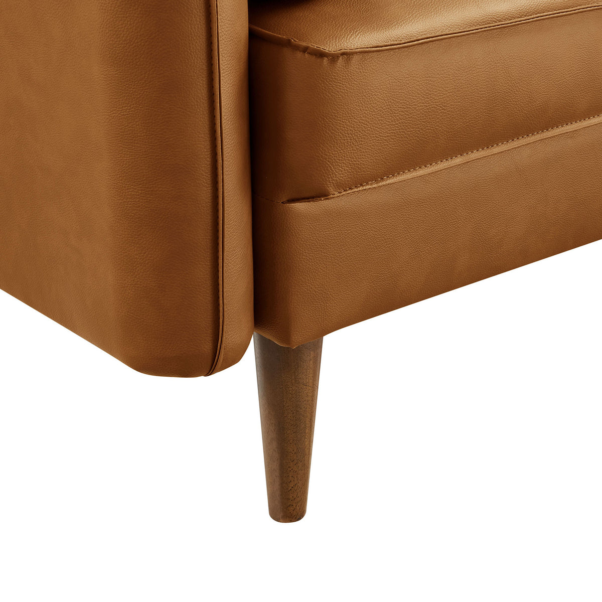 Close-up of the tapered wood leg and neat stitching on the tan vegan leather base. || EEI-6973-TAN || leg_studio