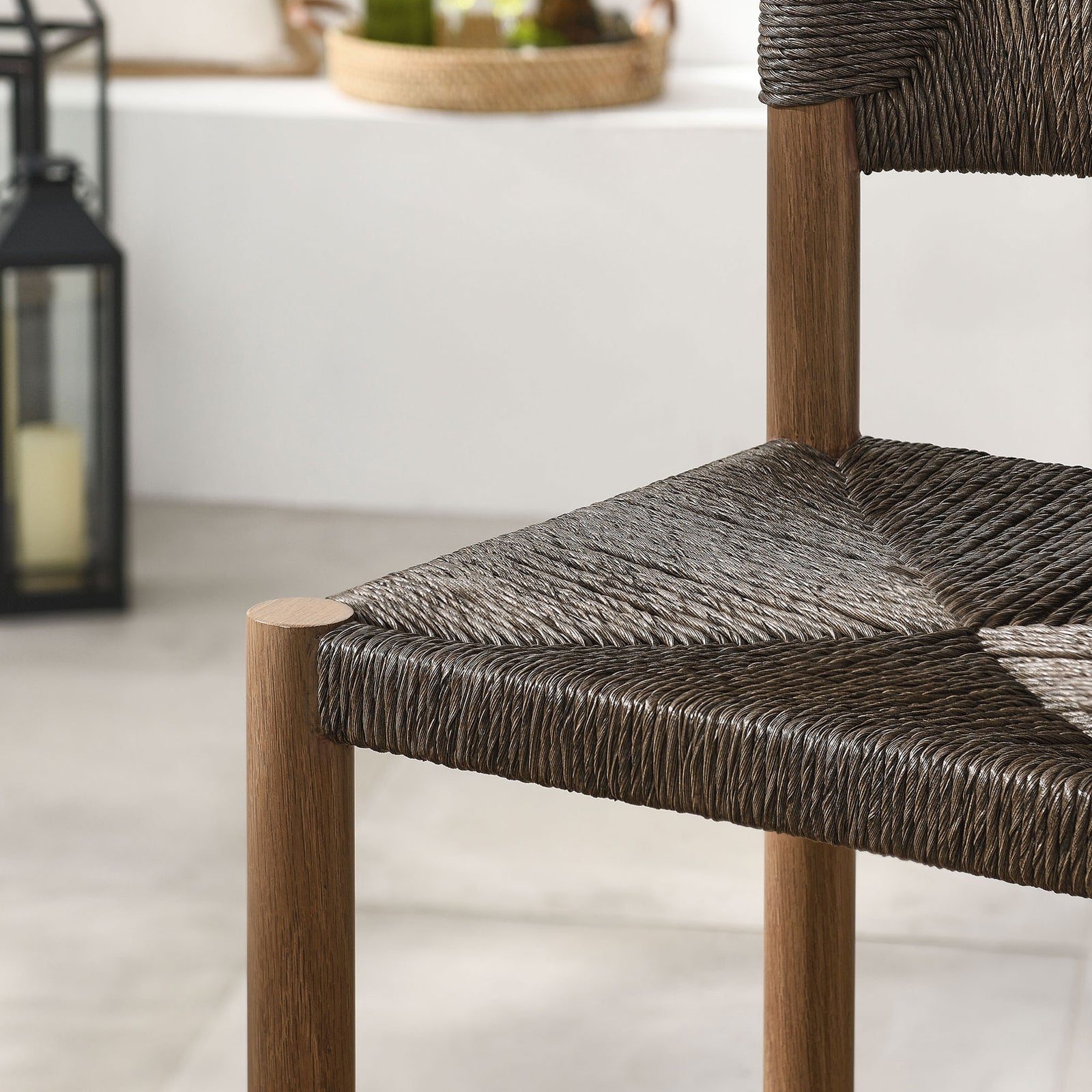 Dark rattan seat pattern contrasts with the light deck for a striking outdoor accent || EEI-6983-WAL || swatch_room