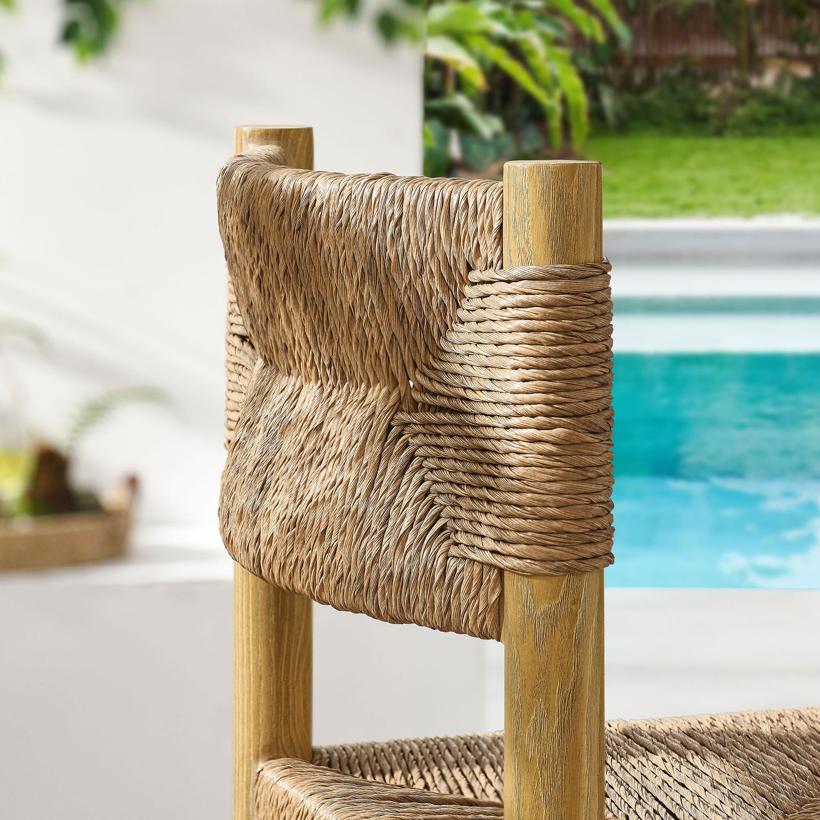 Sunlit woven rattan backrest reveals rich natural color variation and artisanal texture || EEI-6984-NAT || swatch_room