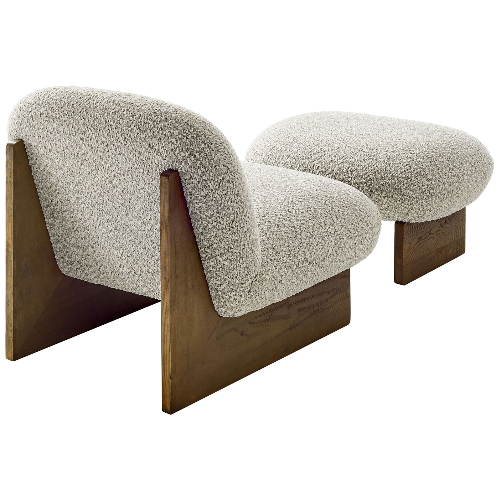 Sculpted ash wood bases frame the rounded boucle forms of this chair and ottoman set || EEI-6988-RIV-WAL || back_angle_studio