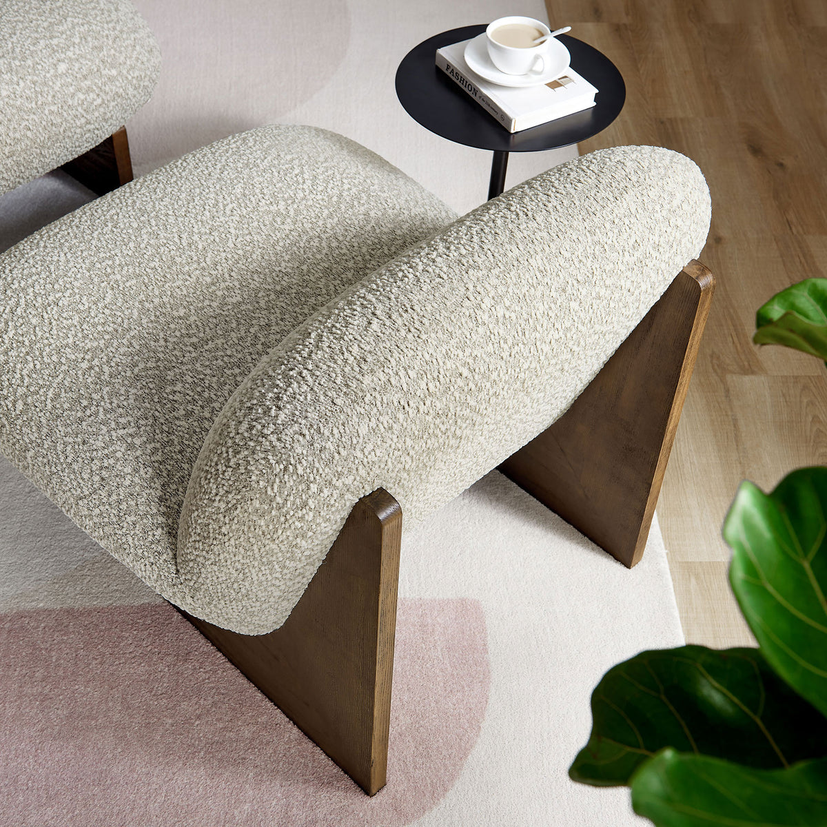 Soft boucle texture pairs with warm wood for a modern, inviting lounge look || EEI-6988-RIV-WAL || detail_room