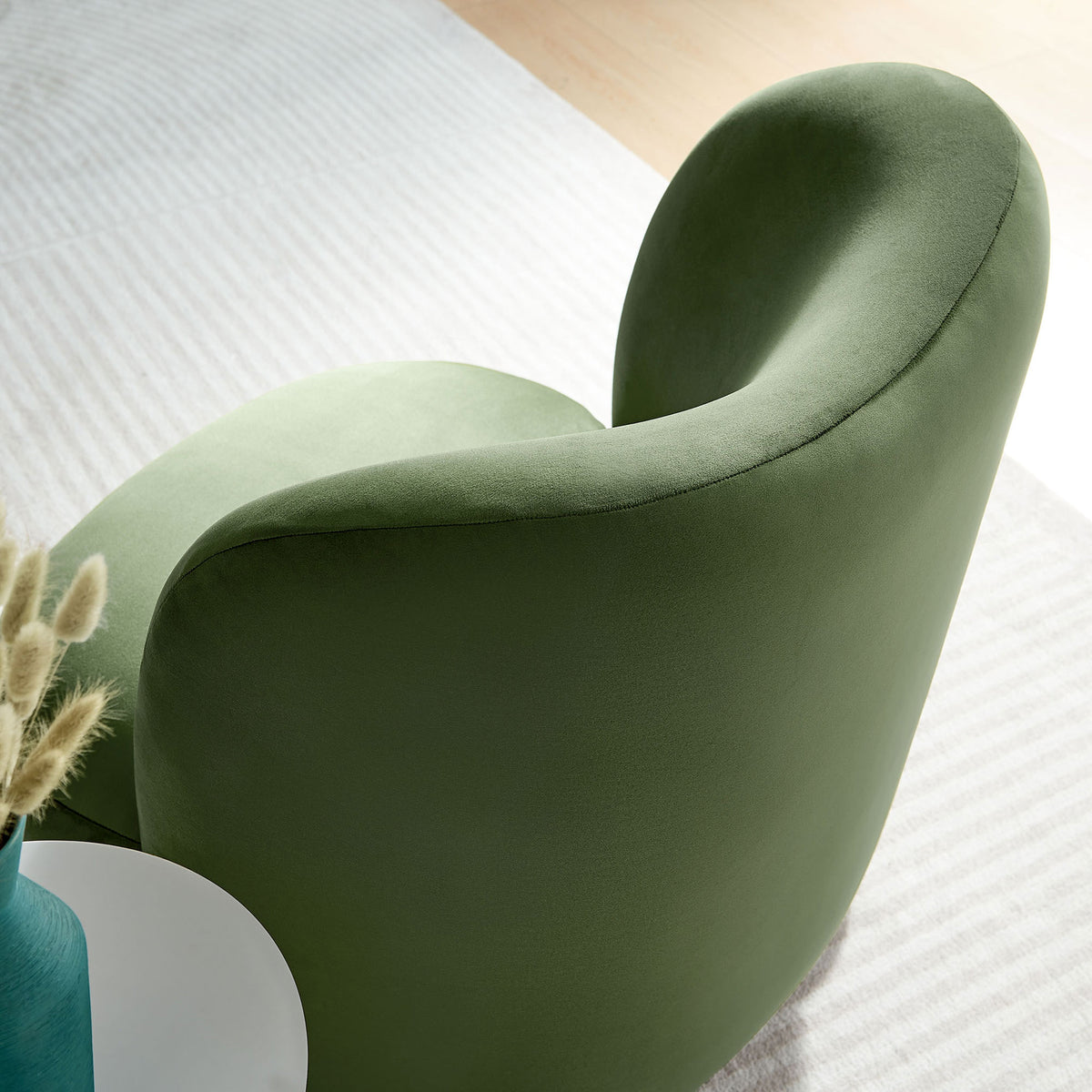 Smooth performance velvet and flowing curves elevate modern living spaces || EEI-6990-MOG-WAL || detail_room