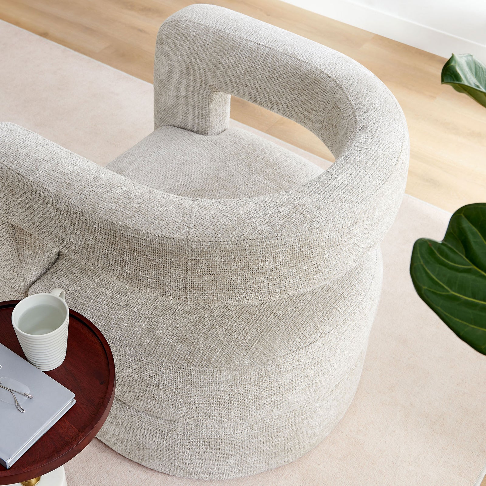 Rounded barrel frame cradles a circular seat, showcasing the soft chenille texture in dove gray || EEI-6991-DOV || top_room