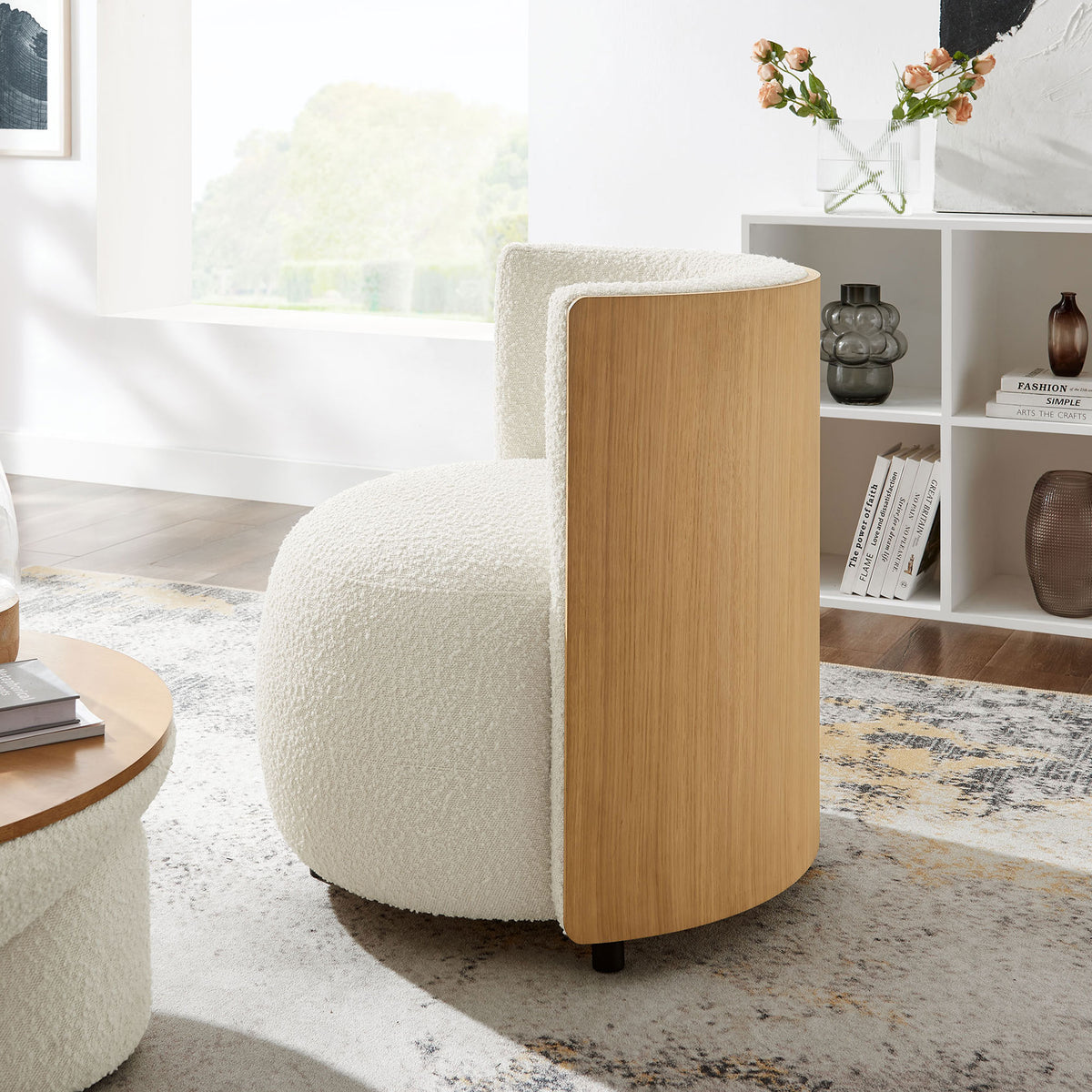 Natural bentwood back curves gracefully, complementing the plush ivory seat || EEI-6994-NAT-IVO || back_angle_room