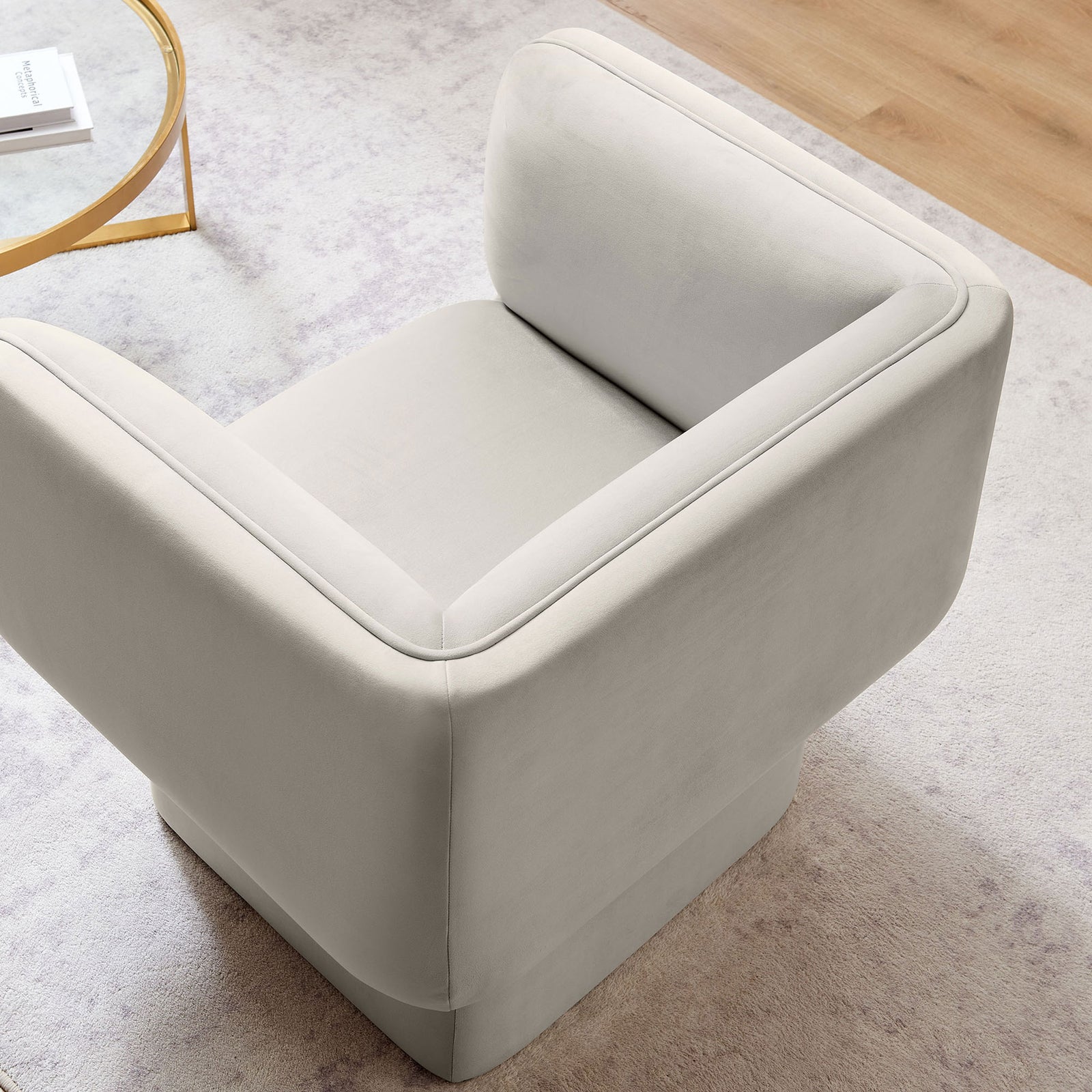 Generous seat and wraparound arms create an inviting nook, clad in soft almond performance velvet || EEI-6995-ALM || top_room
