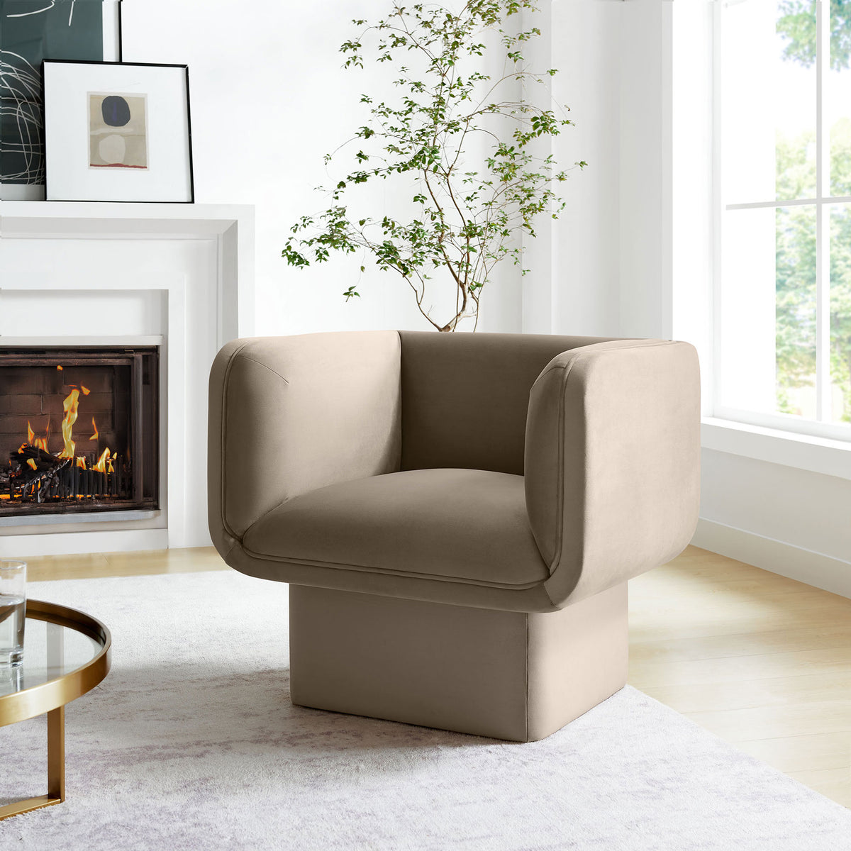 Elevate living spaces with a cube-base accent chair wrapped in soft, stain-resistant taupe velvet. || EEI-6995-TAU || front_angle_room