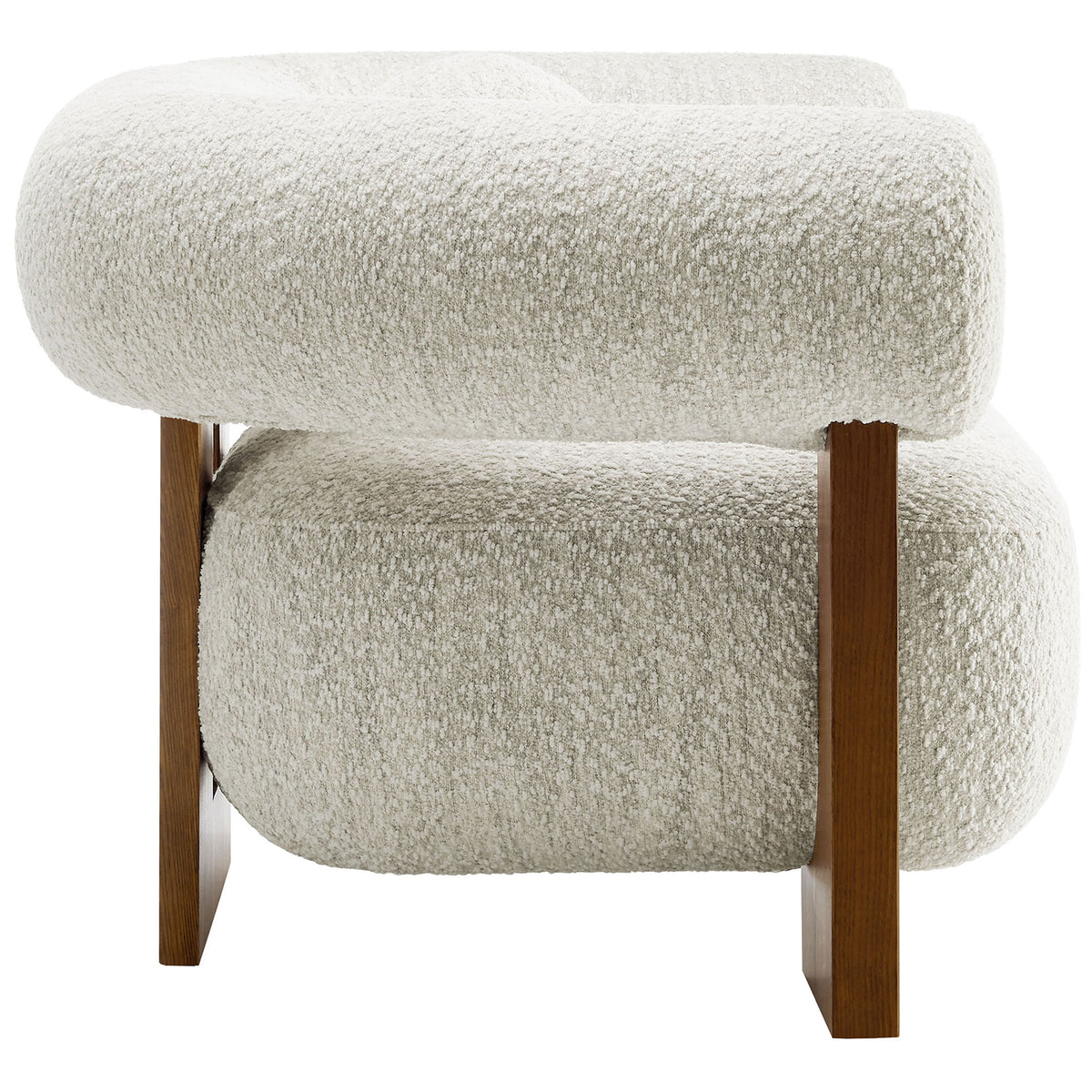 Thick, cloud-like cushioning wraps the seat and back, supported by sturdy ash wood legs. || EEI-6996-PRL || side_studio