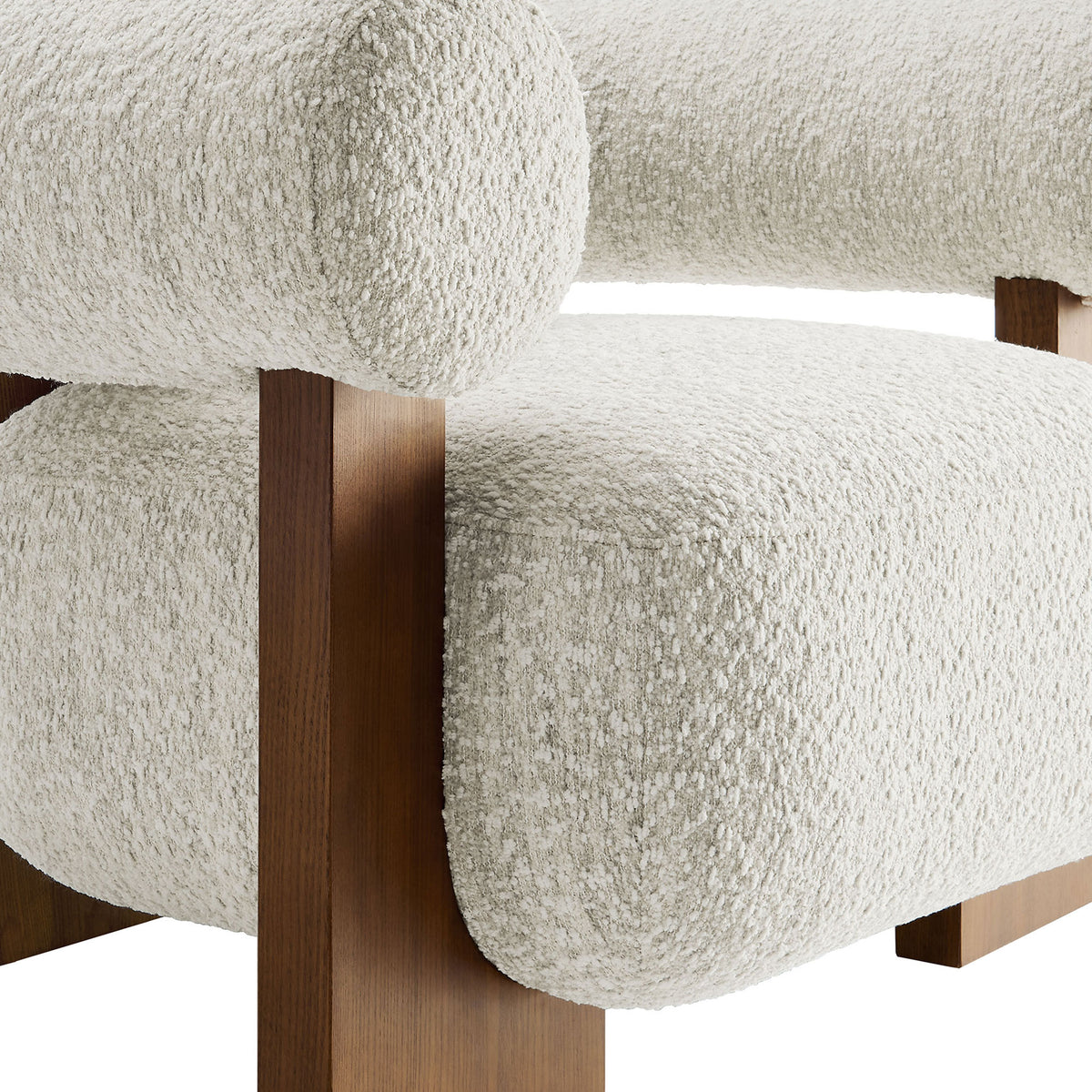 Textured boucle upholstery meets smooth ash wood, showcasing craftsmanship and modern character. || EEI-6996-PRL || detail_studio