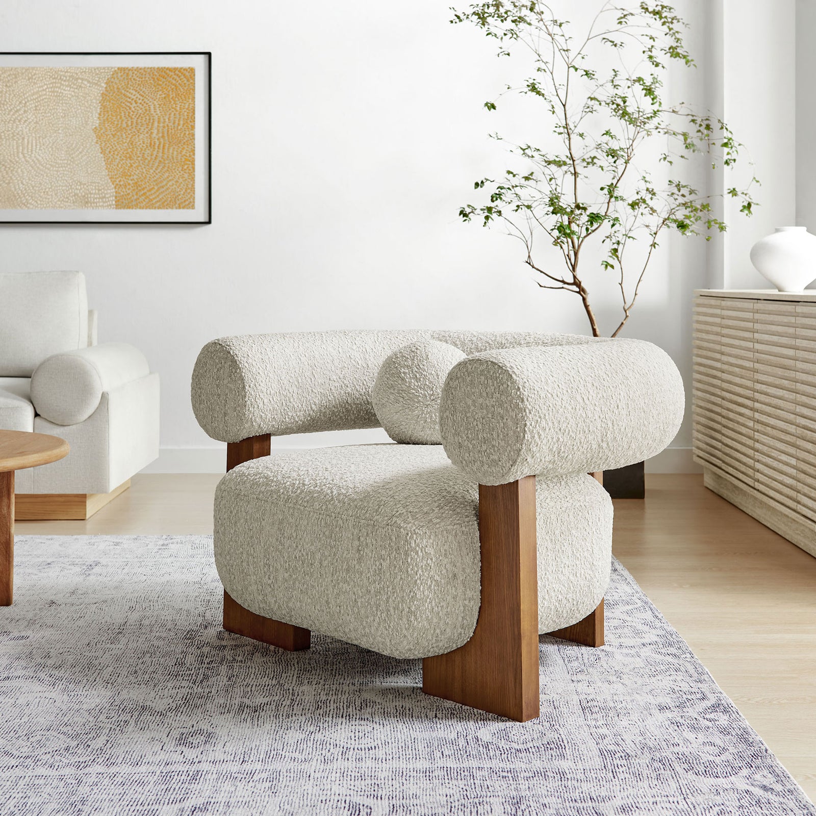 Soft boucle texture and inviting curves create an eye-catching focal point for modern living. || EEI-6996-PRL || front_angle_room