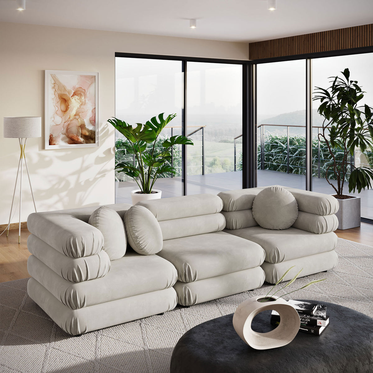 Almond performance velvet sectional creates a cozy lounge space in a modern living room with greenery || EEI-7003-ALM || front_angle_room