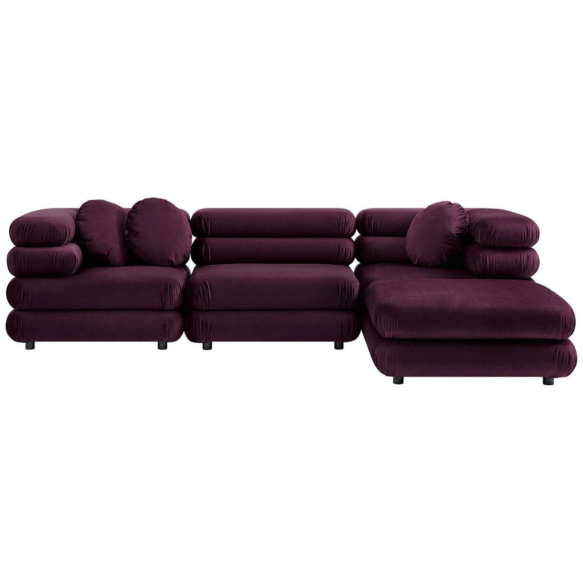 Mulberry velvet modular sectional with chaise and ottoman offers deep, lounge-worthy seating and round pillows || EEI-7004-MUL || front_studio