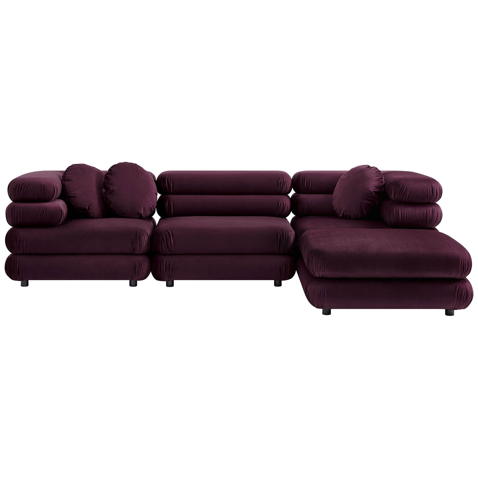 Mulberry velvet modular sectional with chaise and ottoman offers deep, lounge-worthy seating and round pillows || EEI-7004-MUL || front_studio