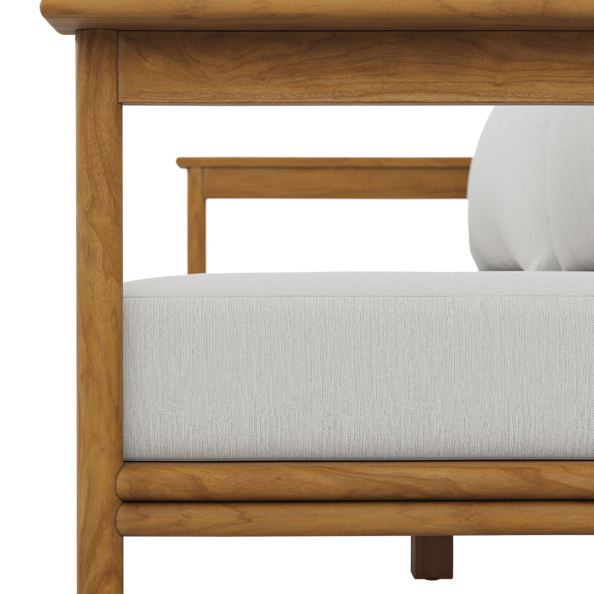 Solid teak base and thick white cushion highlight the sofa's sturdy, weather-ready construction. || EEI-7008-NAT-SAI || detail_studio