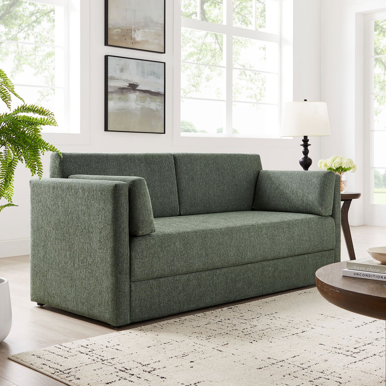 Linden eucalyptus green sofa with heathered chenille upholstery anchoring a modern light-filled living room || EEI-7012-EUC || front_angle_room