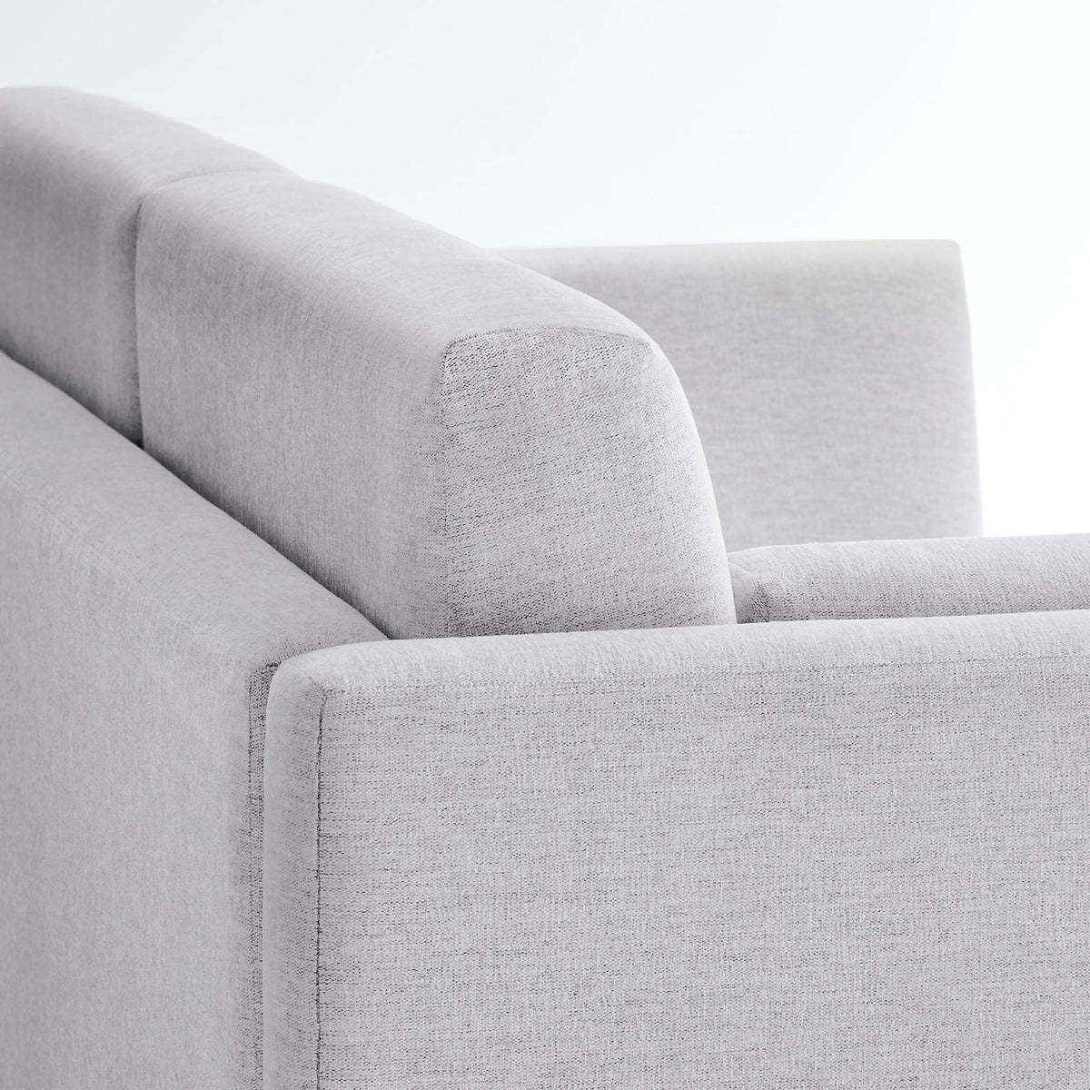 Heathered chenille fabric and neatly tailored seams highlight the sofa's soft, textured finish || EEI-7012-NPT || detail_studio
