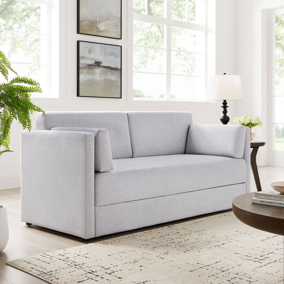 Linden sofa anchors an airy living room with crisp lines, light gray upholstery, and cozy accent decor || EEI-7012-NPT || front_angle_room