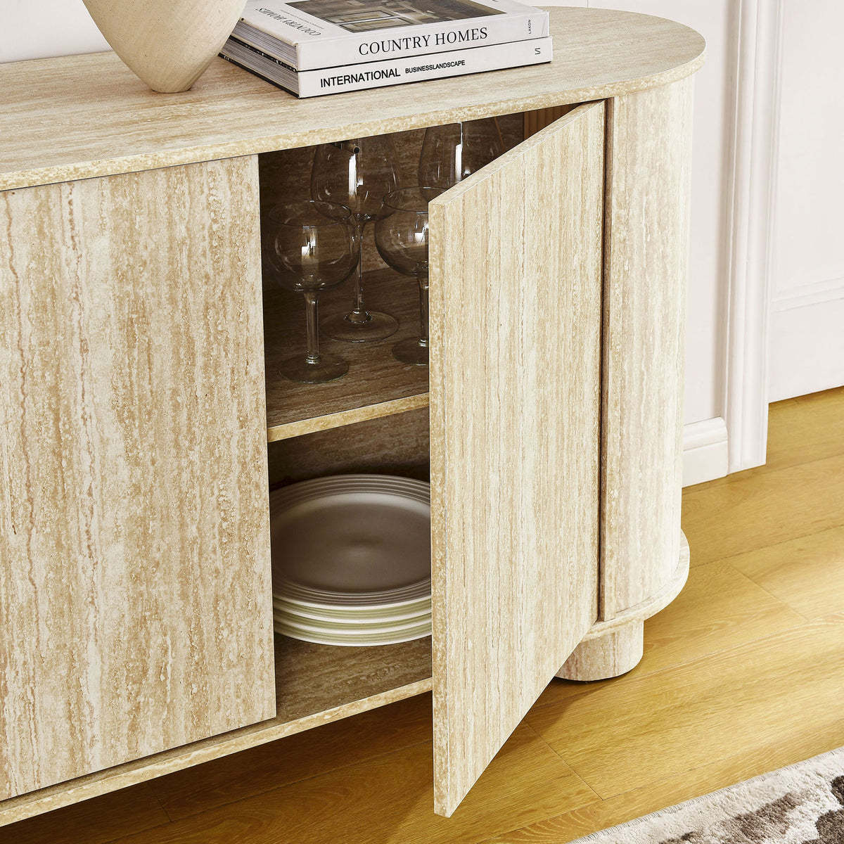 Push-to-open door reveals spacious shelving inside the sideboard for neatly storing dinnerware and glassware. || EEI-7015-TRA || storage_open_room