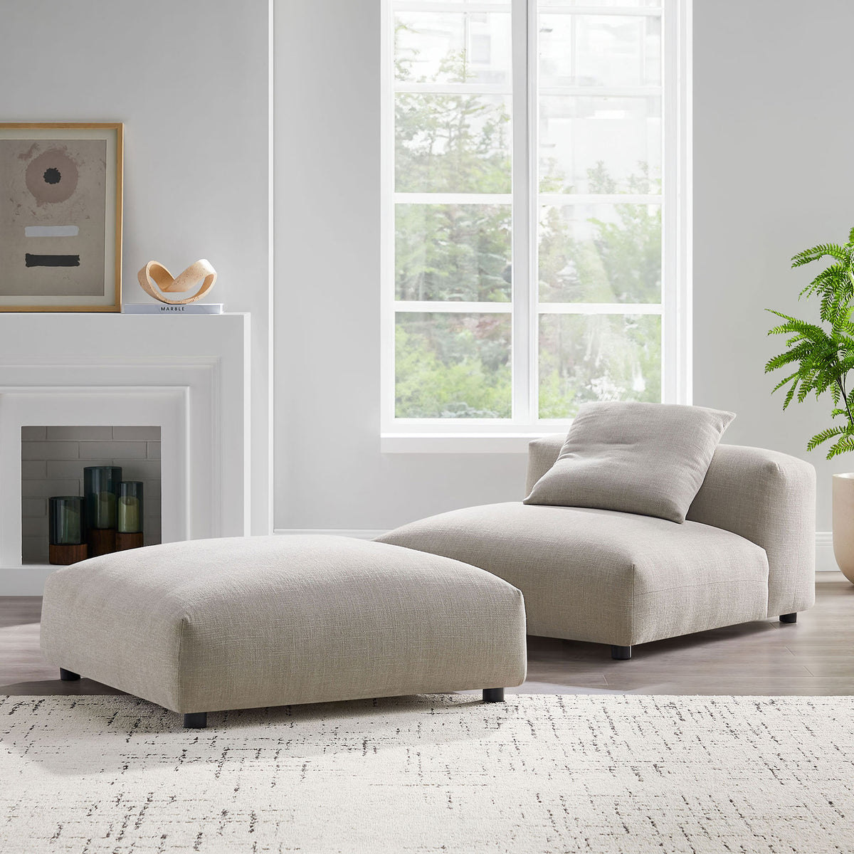 Relaxed, low-slung silhouette brings modern comfort to the living room with a coordinated ottoman || EEI-7023-LIN || front_angle_room