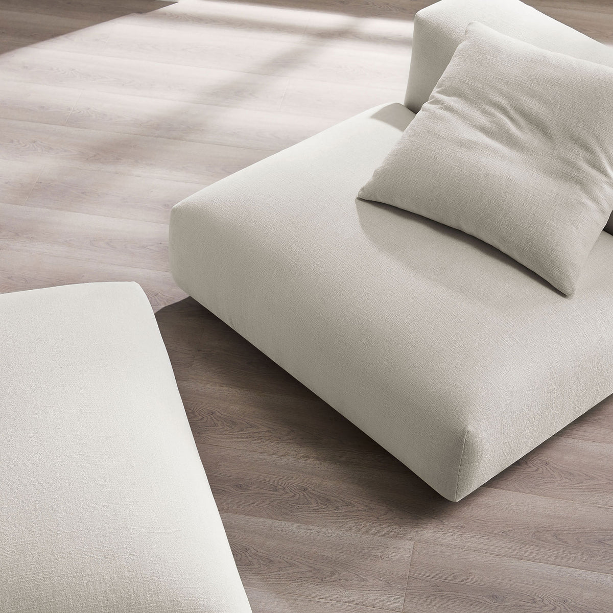 Textured woven upholstery and overstuffed cushioning invite lounge-worthy comfort with the included pillow || EEI-7023-SAL || detail_room