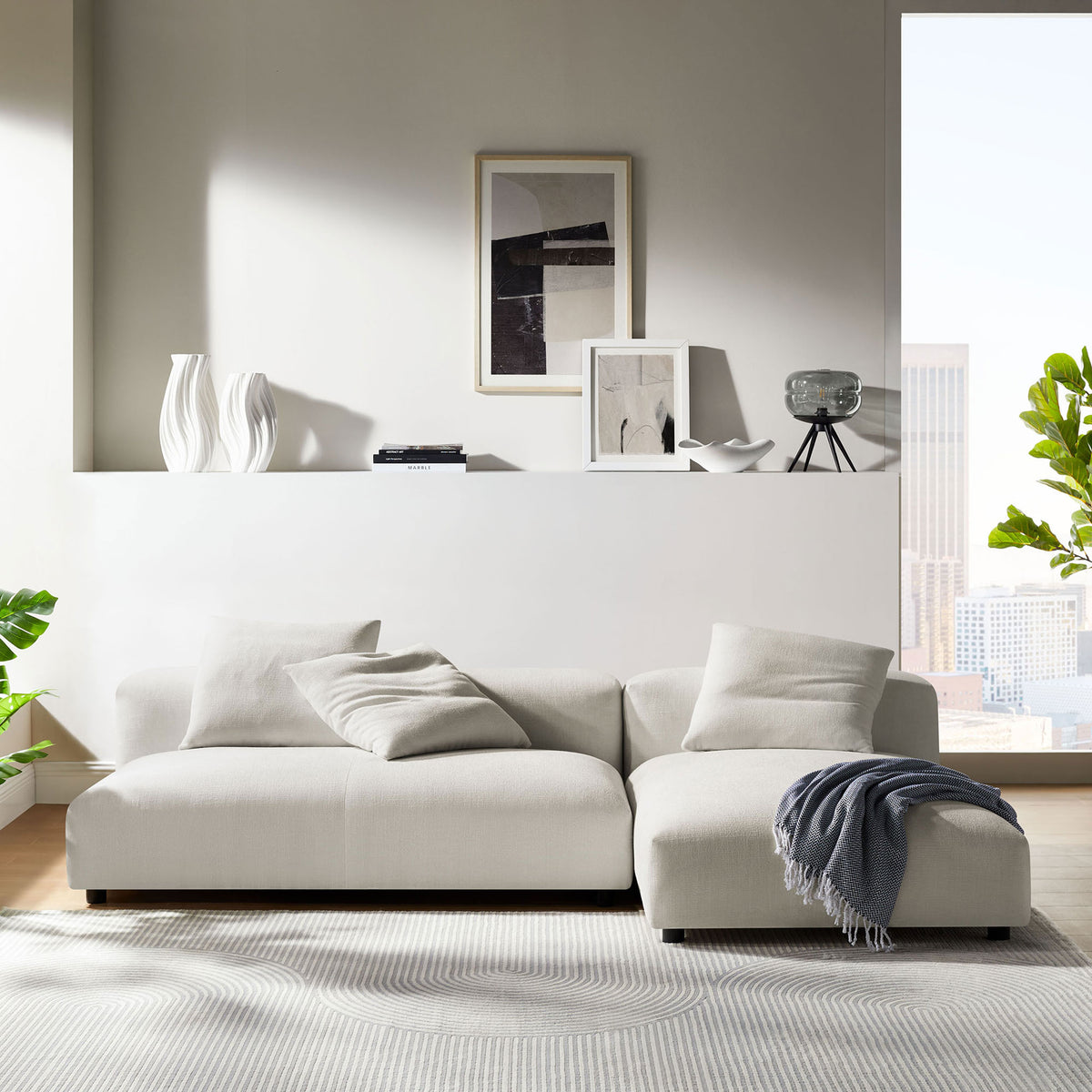 Salt fabric sectional with chaise styled in a bright modern living room setting || EEI-7025-SAL || front_room
