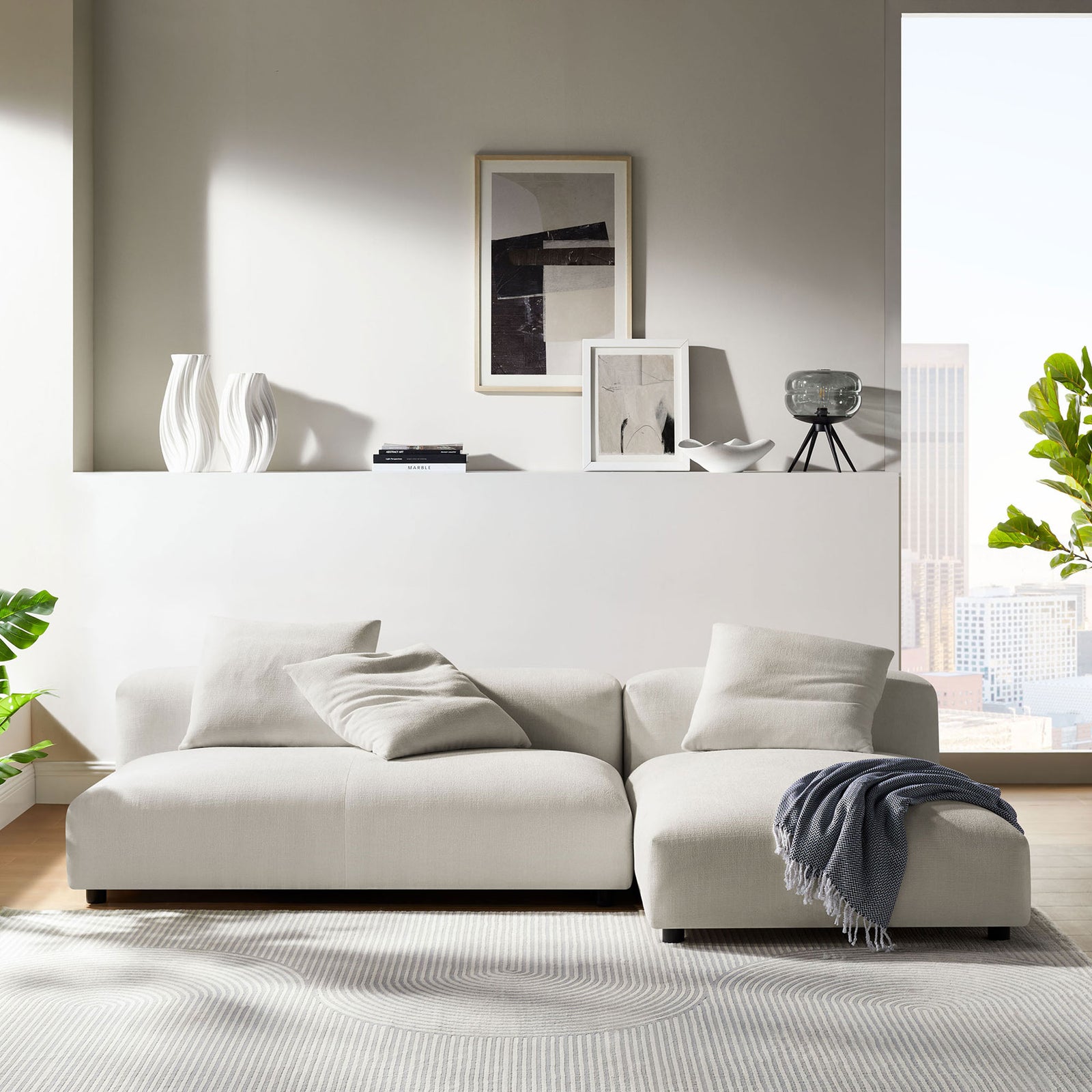 Salt fabric sectional with chaise styled in a bright modern living room setting || EEI-7025-SAL || front_room