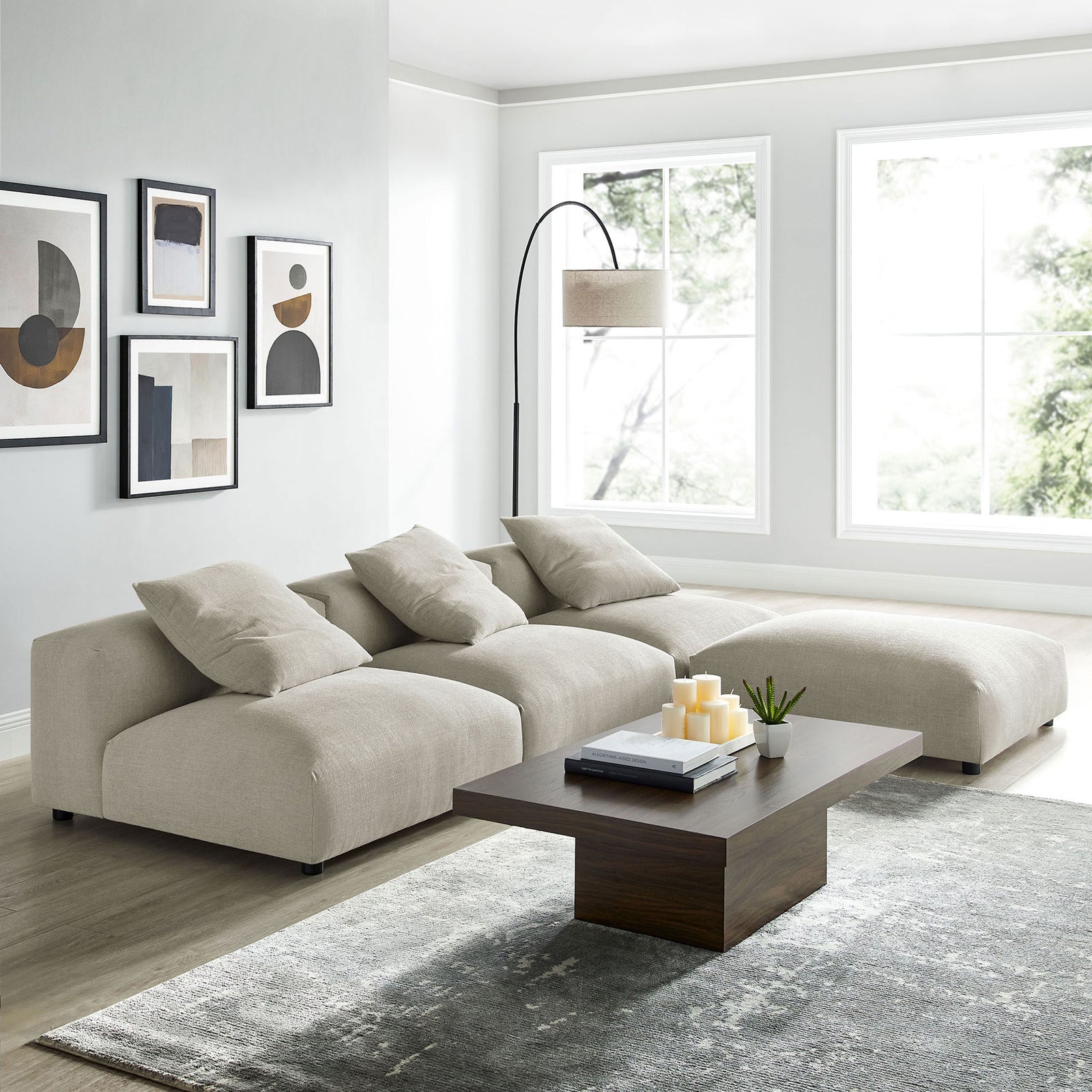 Bright living room with the linen modular sectional configured in an L shape for expansive lounge seating || EEI-7027-LIN || front_angle_room