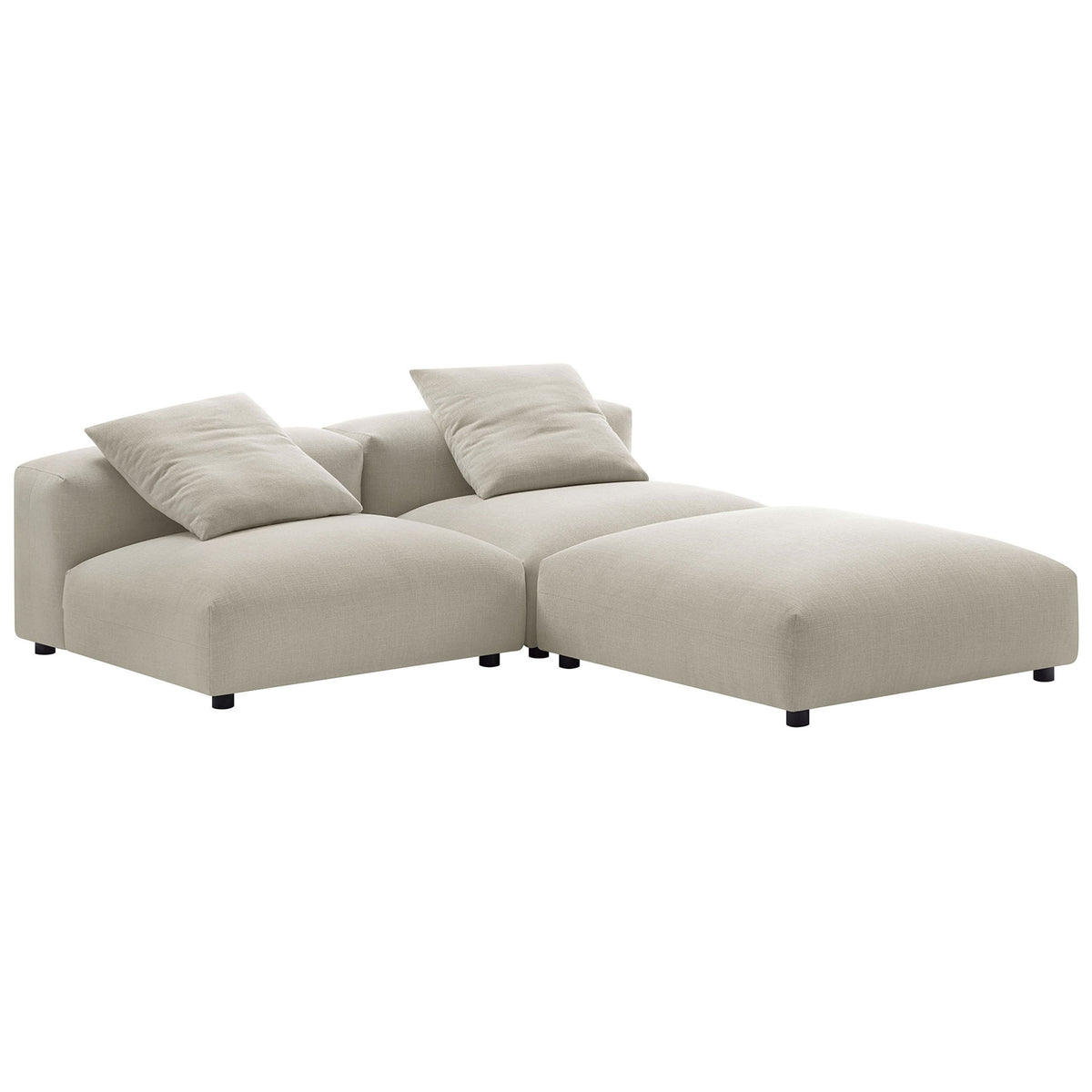 L shaped linen modular sectional configured with an extended chaise style seat and plush pillows || EEI-7029-LIN || front_angle_studio