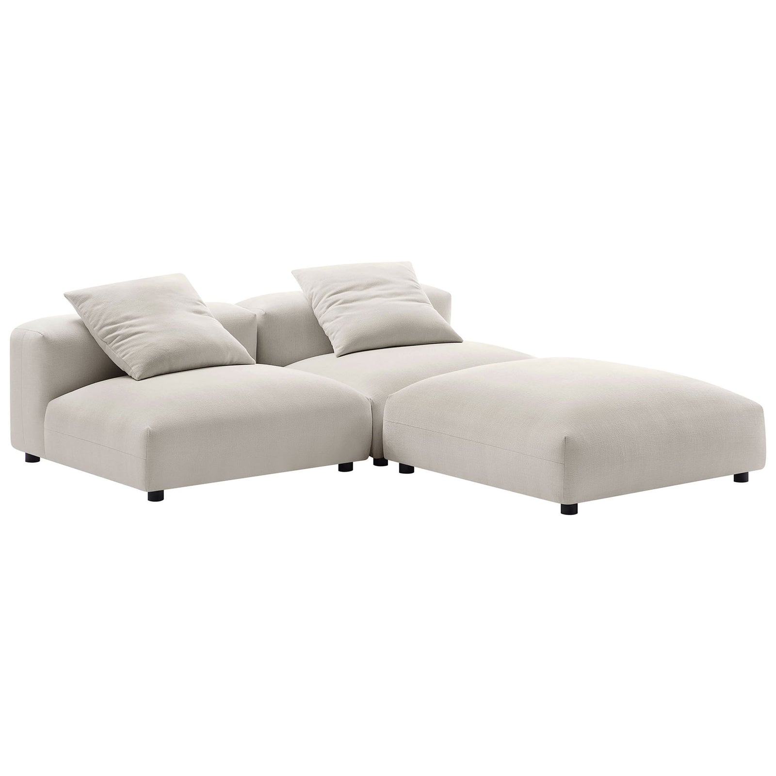 Spacious L-shaped modular sectional in salt fabric offering lounge-ready corner seating and pillows || EEI-7029-SAL || front_angle_studio