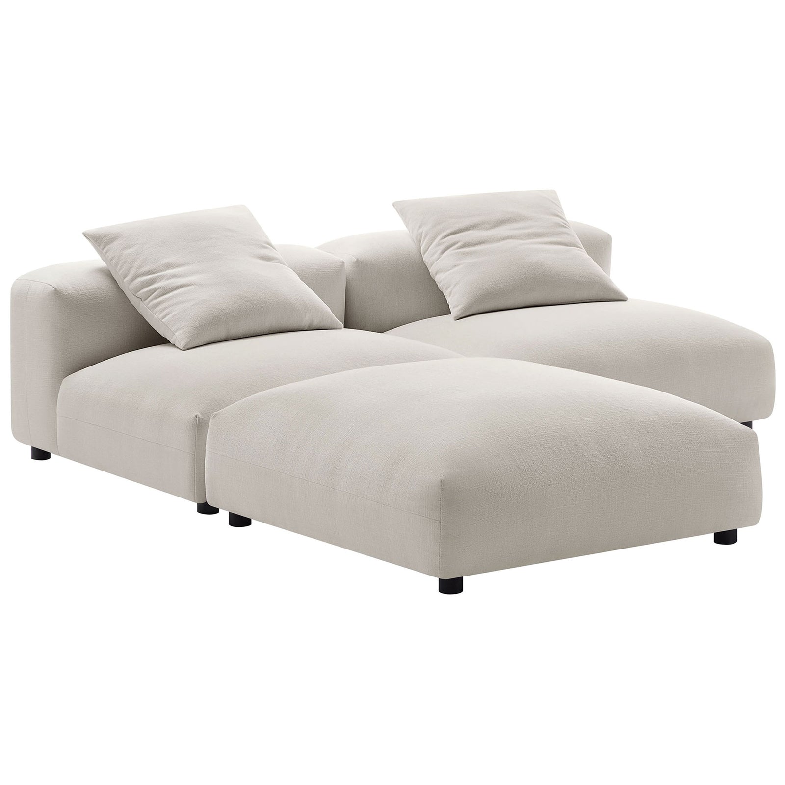 Cozy modular chaise configuration in salt fabric with an armless seat and oversized ottoman || EEI-7029-SAL || front_angle_studio