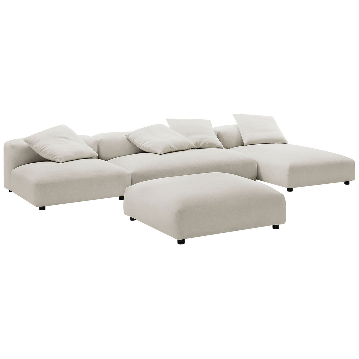 Low-profile salt fabric modular sectional with chaise and ottoman, styled with plush accent pillows || EEI-7033-SAL || front_angle_studio