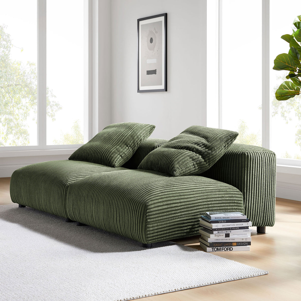 Green corduroy modular sofa in a bright living room with pillows angled for laid-back lounging || EEI-7036-FRN || front_angle_room