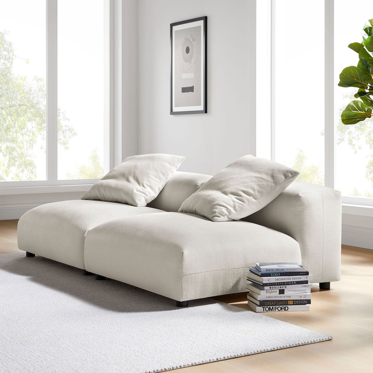 Solace 2-piece salt fabric modular sofa styled in a bright modern living room with accent decor || EEI-7037-SAL || front_angle_multi_room