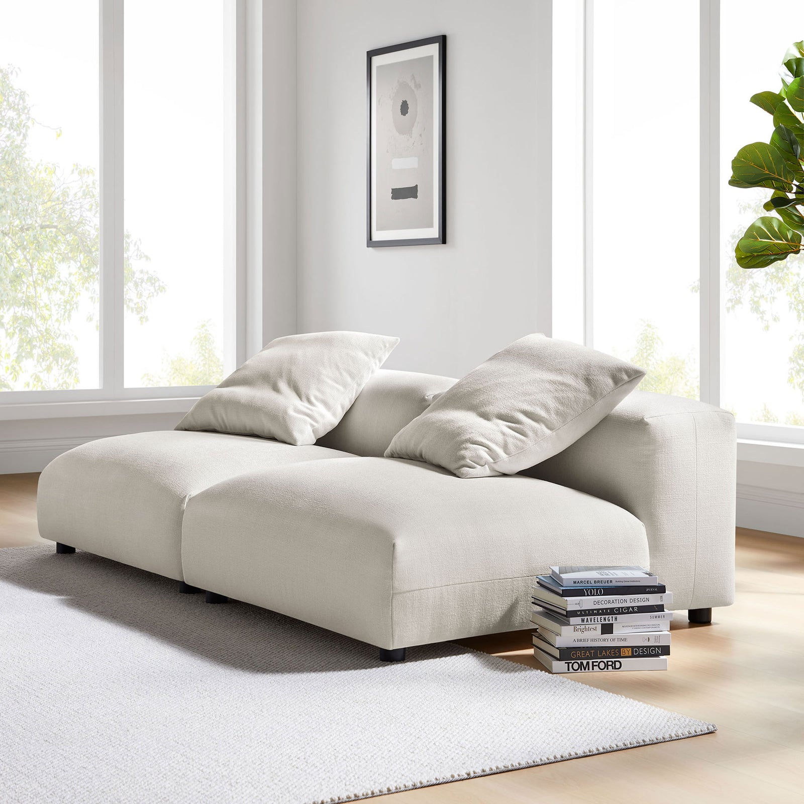 Solace 2-piece salt fabric modular sofa styled in a bright modern living room with accent decor || EEI-7037-SAL || front_angle_multi_room