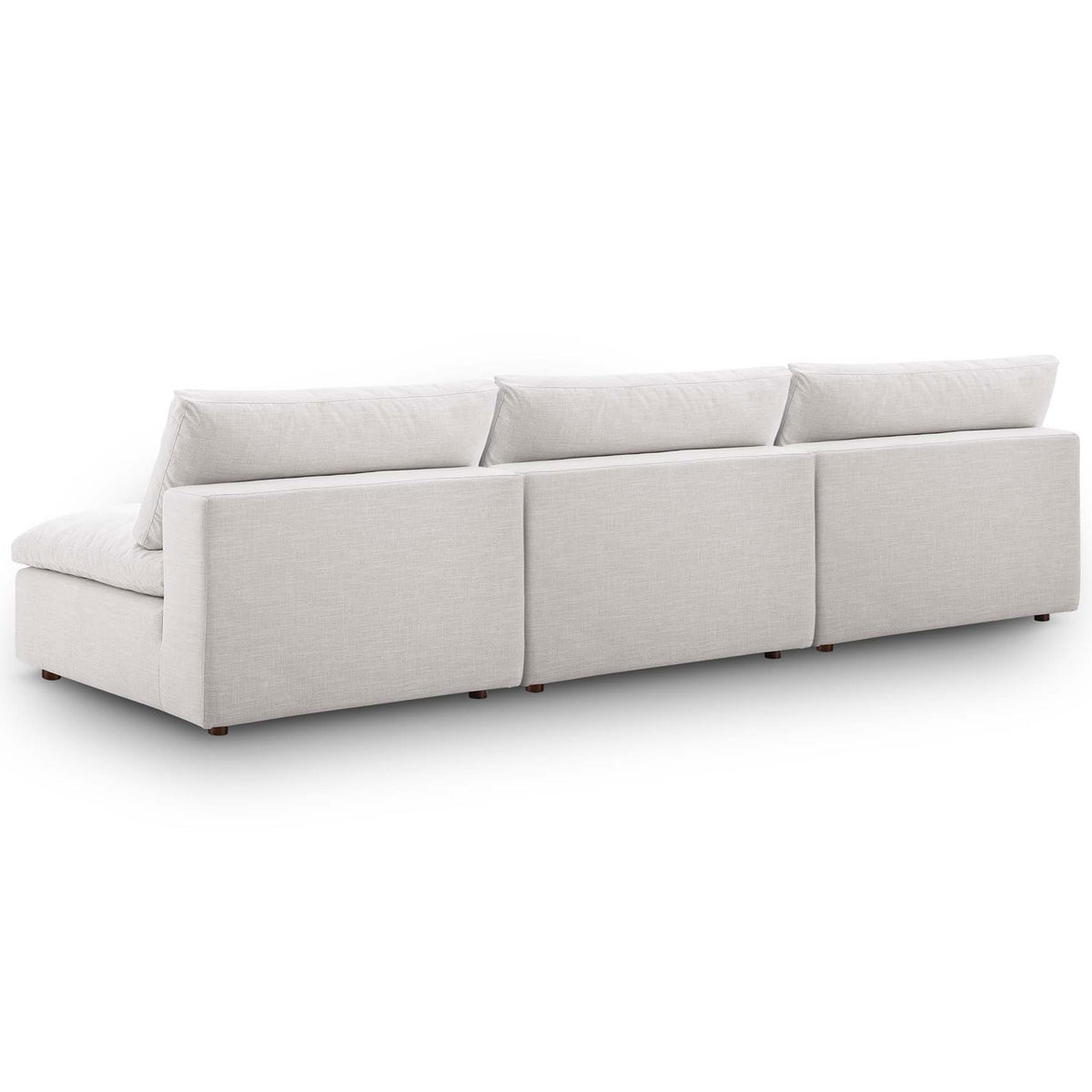 Beige sectional sofa shown from the back with smooth upholstery and a low-profile base on wood feet. || EEI-7043-BEI || back_angle_studio