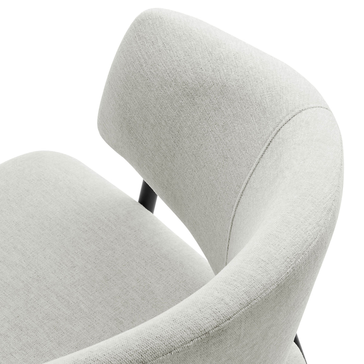 Detail of soft heathered chenille upholstery and curved upper backrest for a cozy, tailored look || EEI-7045-NPT-BLK || detail_studio