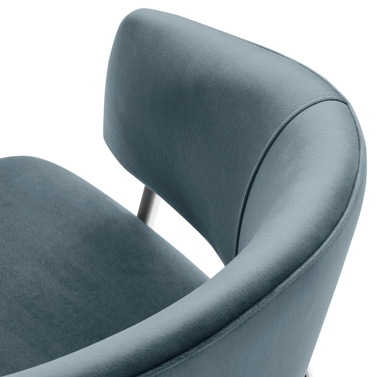 Plush performance velvet upholstery and gently curved barrel back detail for soft, supportive seating. || EEI-7046-CAD-SLV || detail_studio