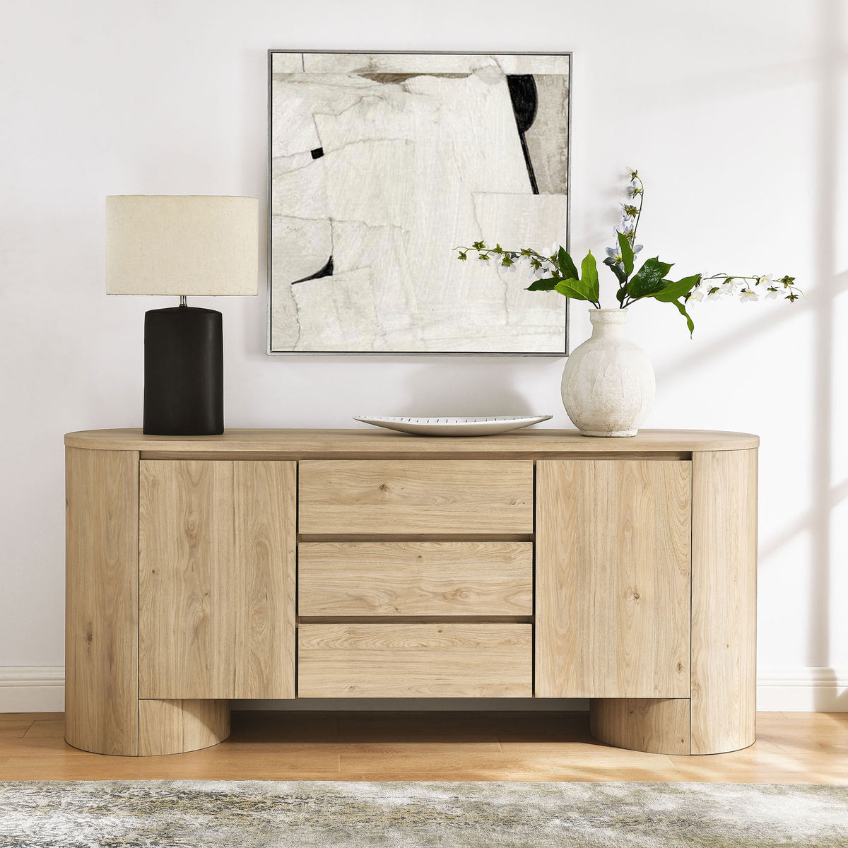 Duval sideboard styled with lamp, vase, and abstract wall art for a clean, modern entryway look || EEI-7050-HCK || front_room