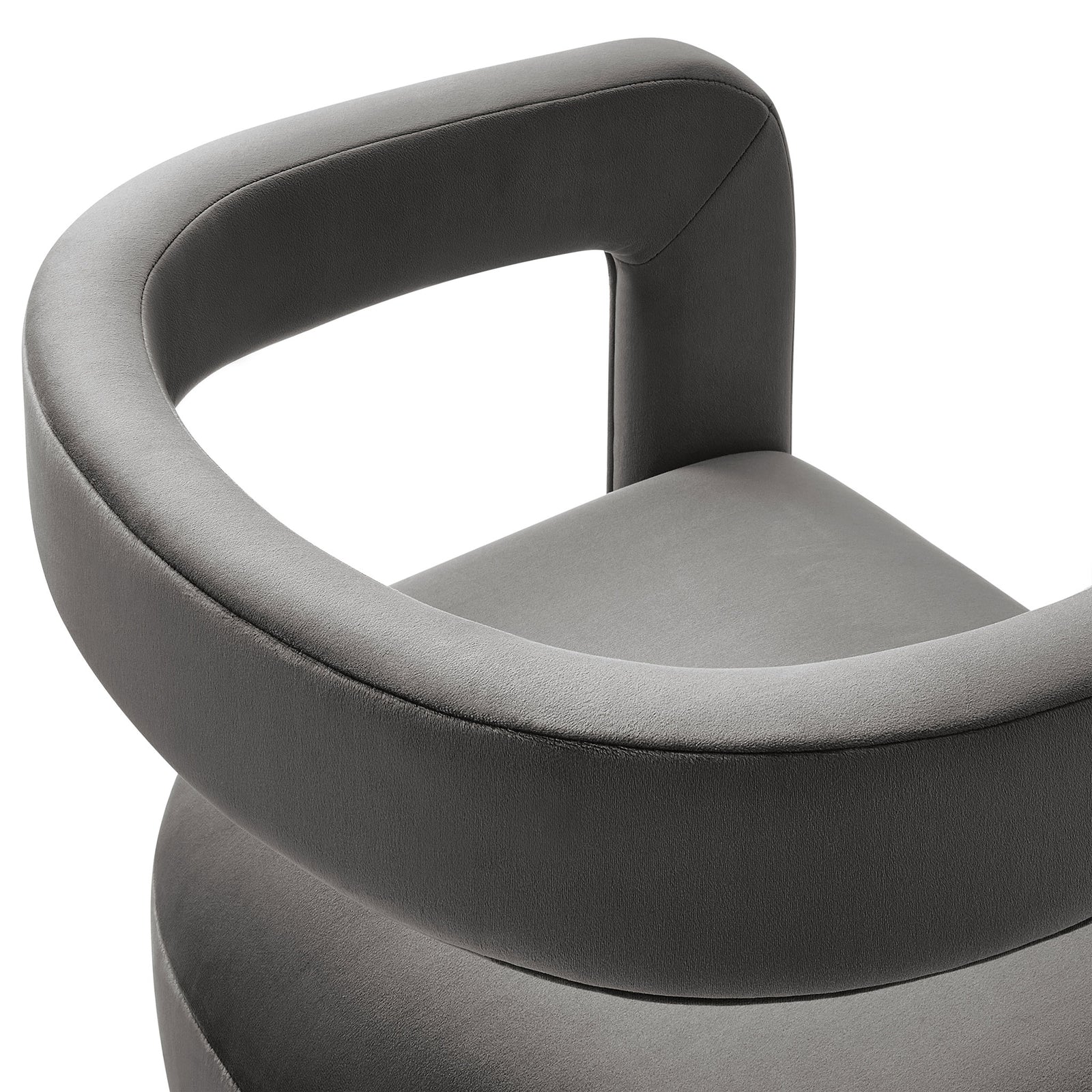 Curved velvet backrest and arm of the storm gray chair, highlighting smooth, tailored upholstery. || EEI-7052-STG || detail_studio