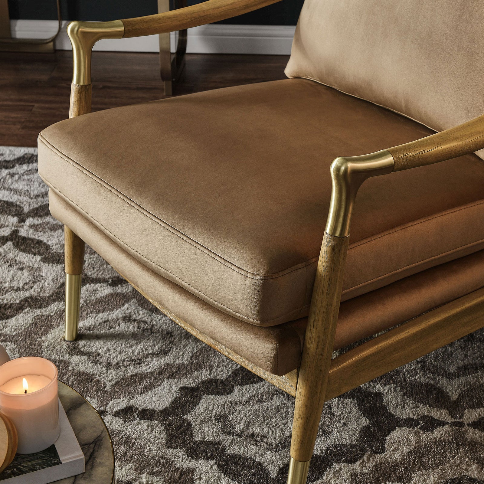 Plush taupe velvet seat and brass-detailed arm bring mid-century warmth to a cozy living space || EEI-7056-TAU-WAL || detail_room