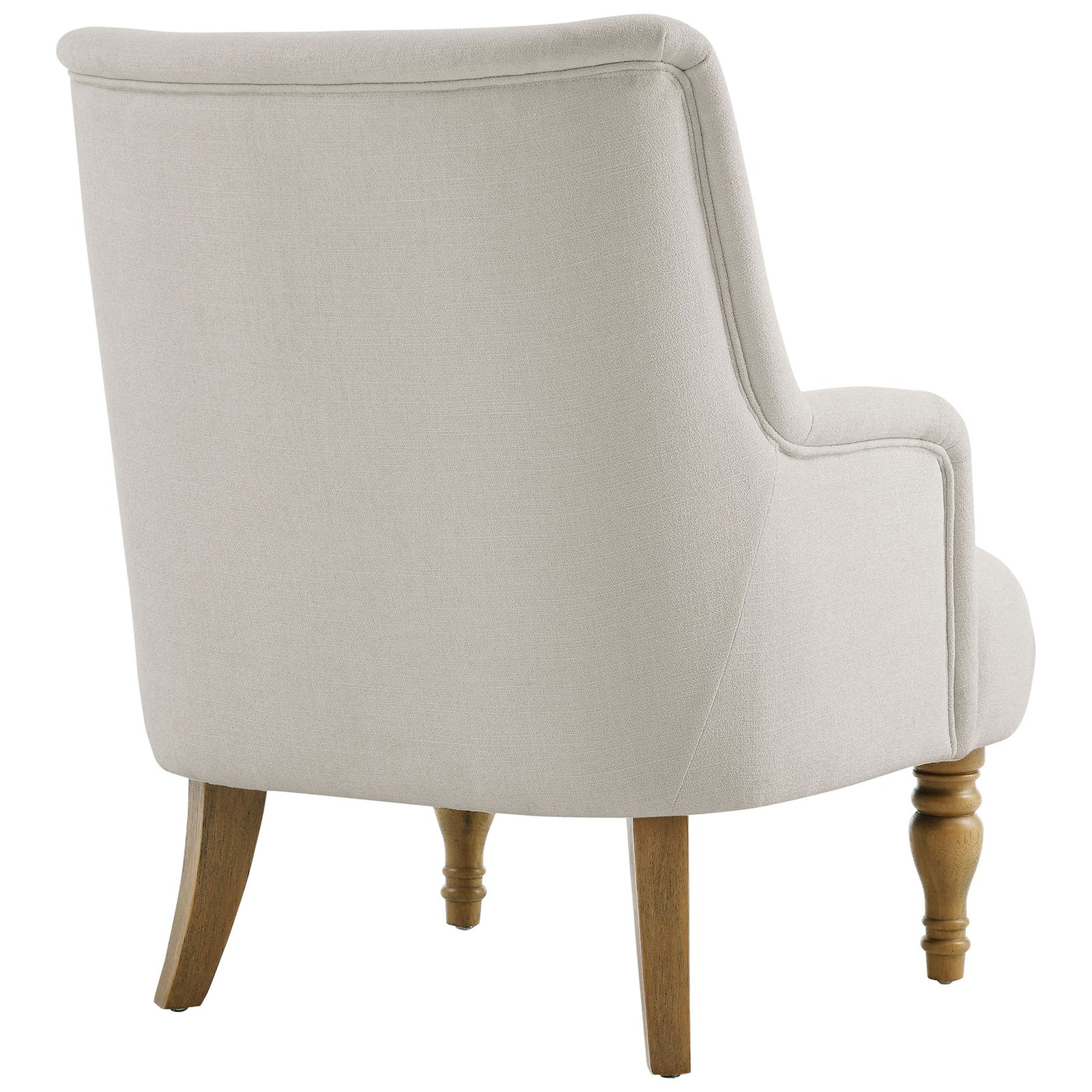Smooth upholstered back and sculpted turned legs showcase classic craftsmanship in a light hue. || EEI-7057-SAL || back_angle_studio