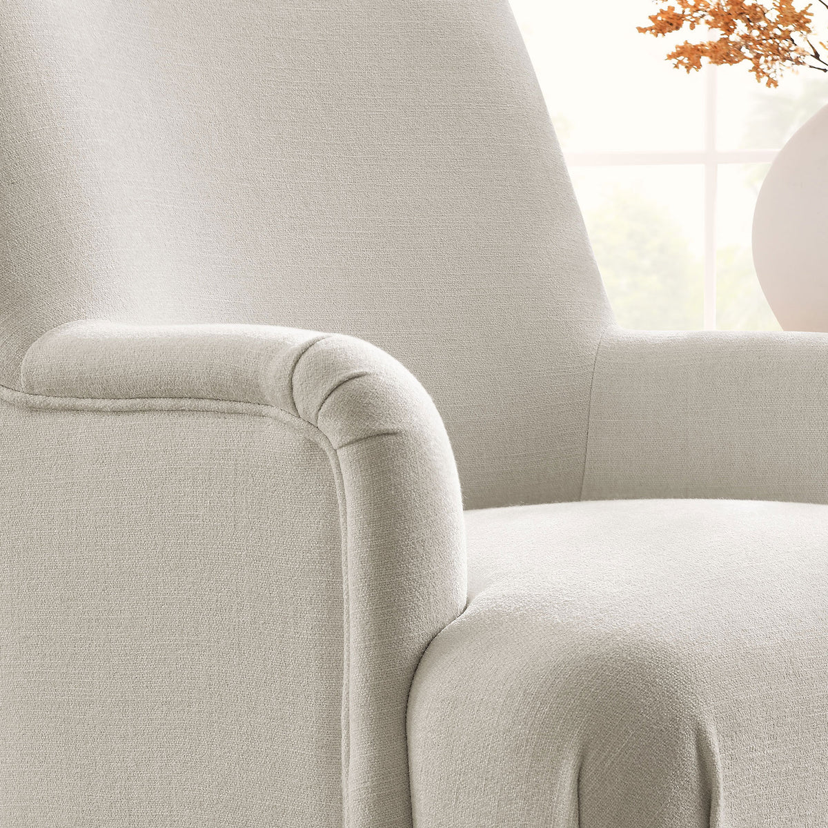 Textured salt fabric and neatly sewn piping offer tactile comfort and lasting style. || EEI-7057-SAL || detail_room