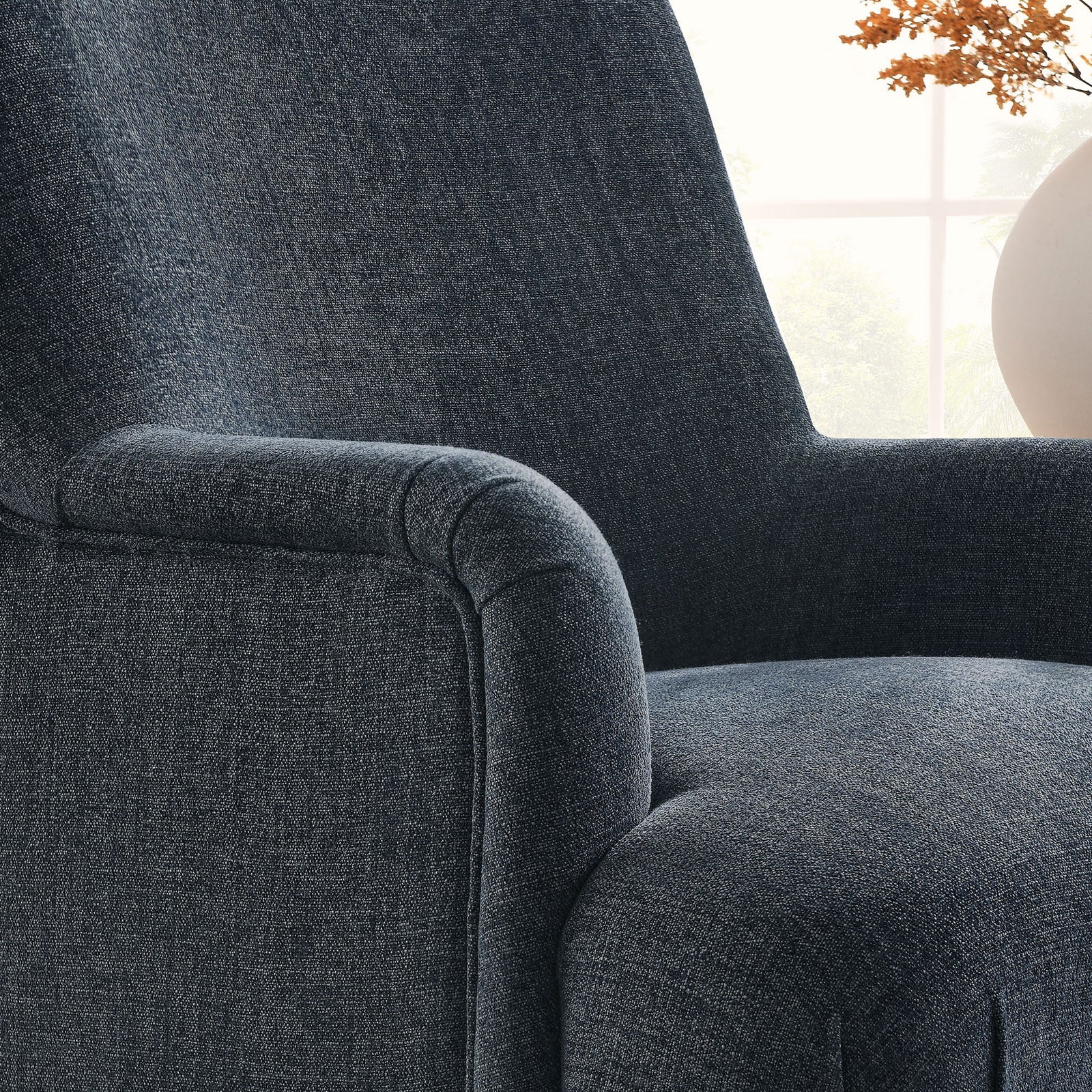 Rich slate blue fabric and French piping bring texture and polish to the arm and seat || EEI-7057-SLB || detail_room